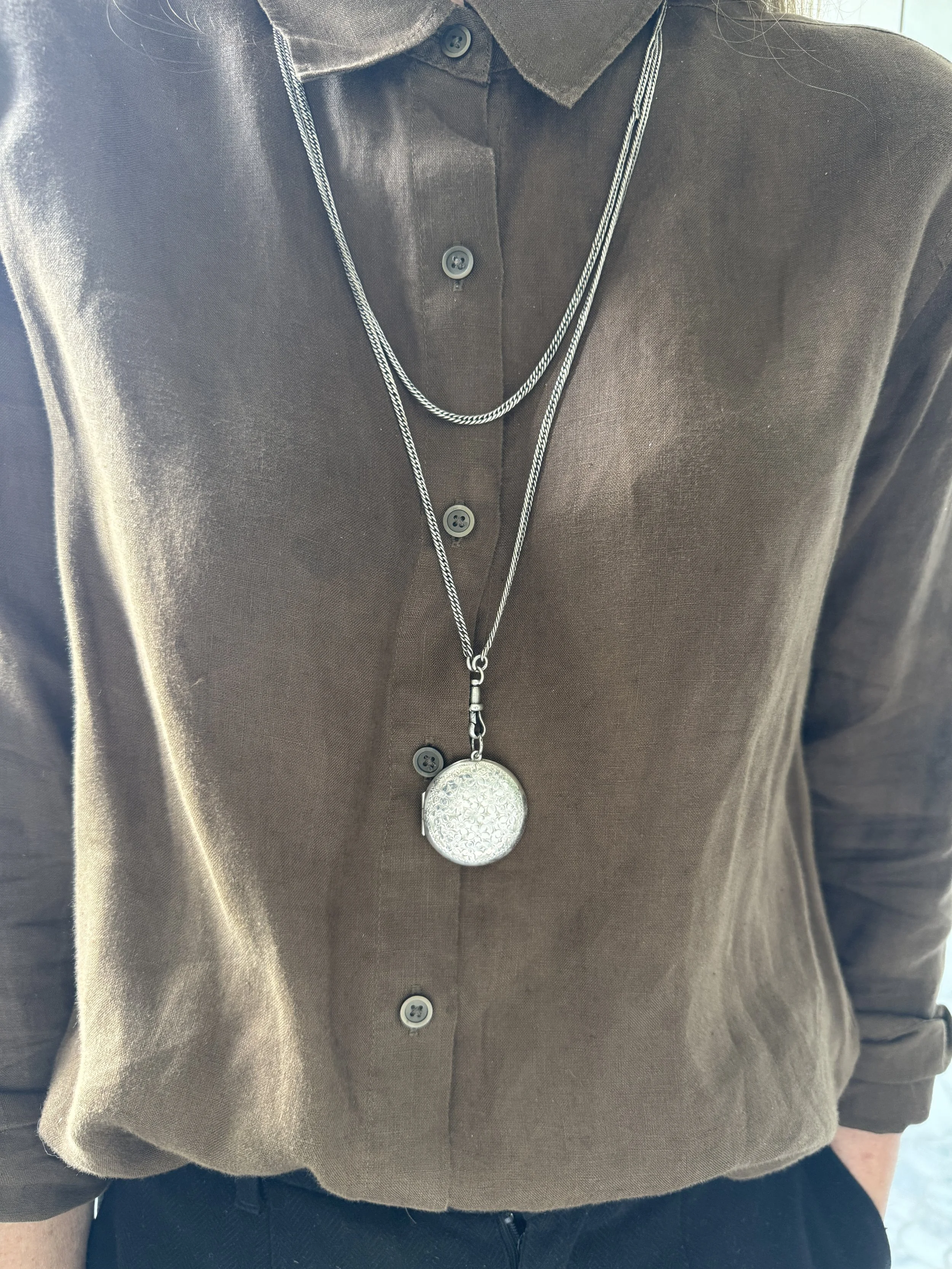 BVL1257-large-silver-embossed-locket-worn.JPG