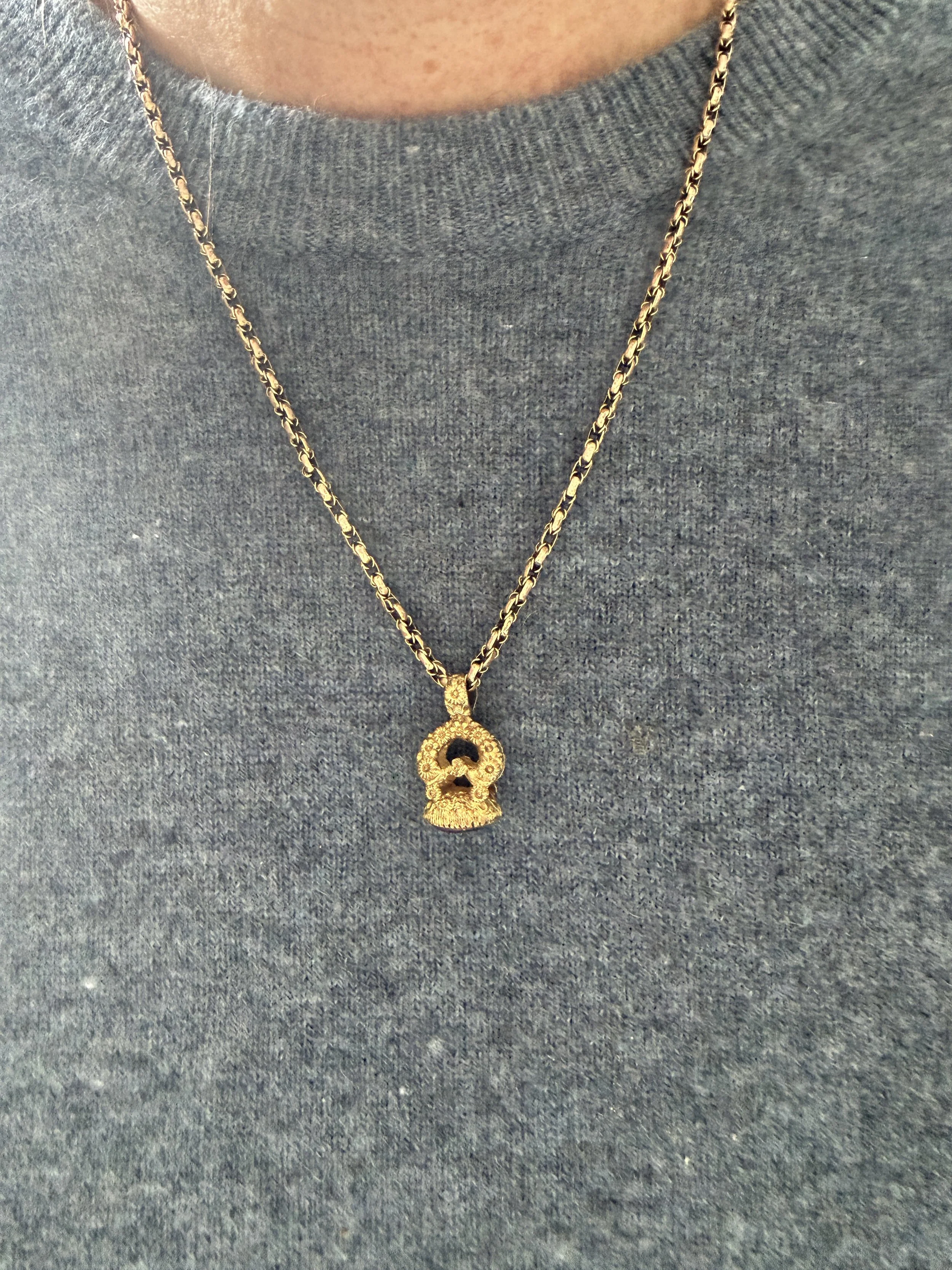 BVL1082-purple-oval-seal-pendant-worn.JPG