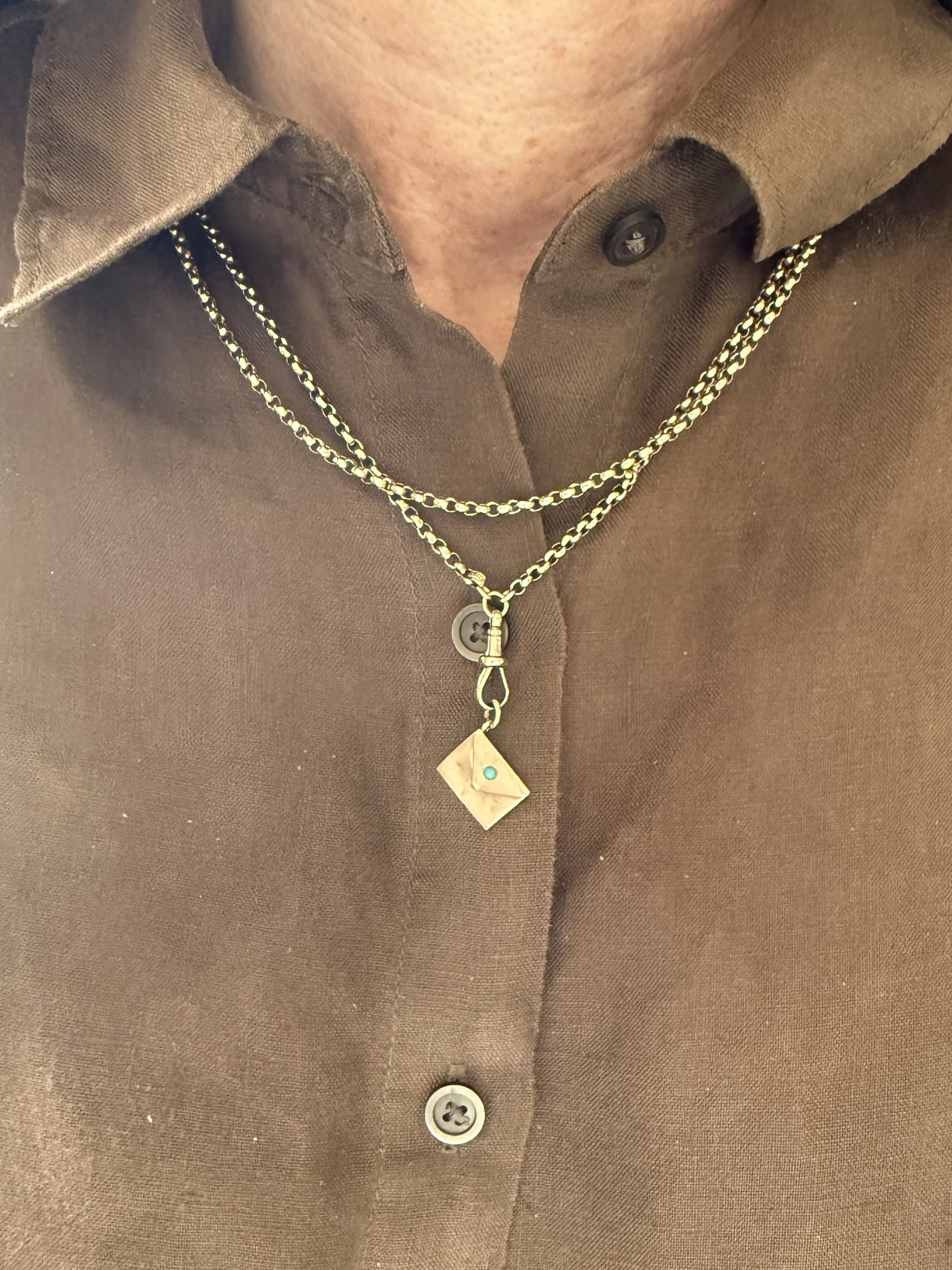 BVL1093-turquoise-envelope-charm-worn.jpg