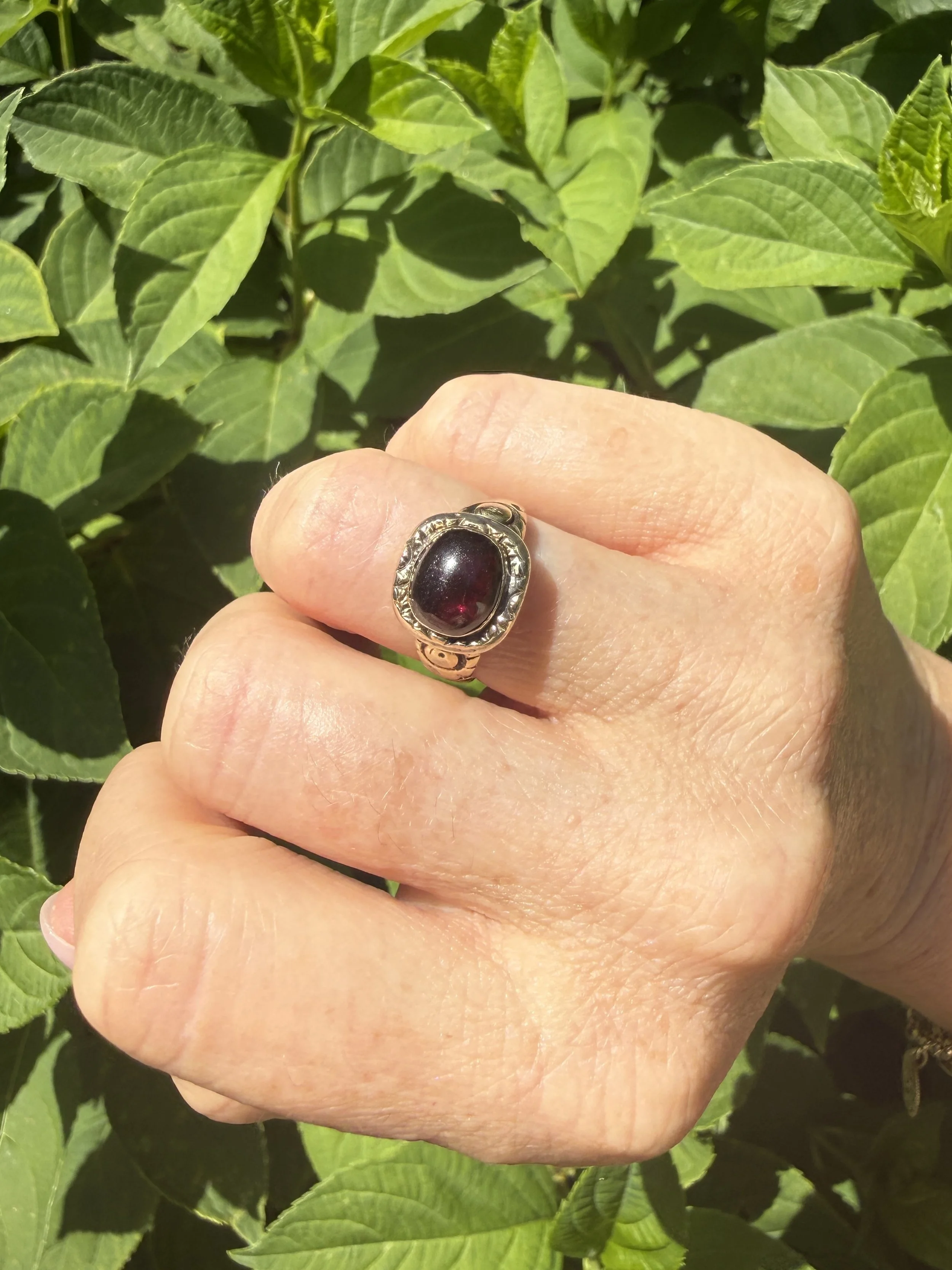 BVL1212-garnet-cabochon-ring-worn.jpg