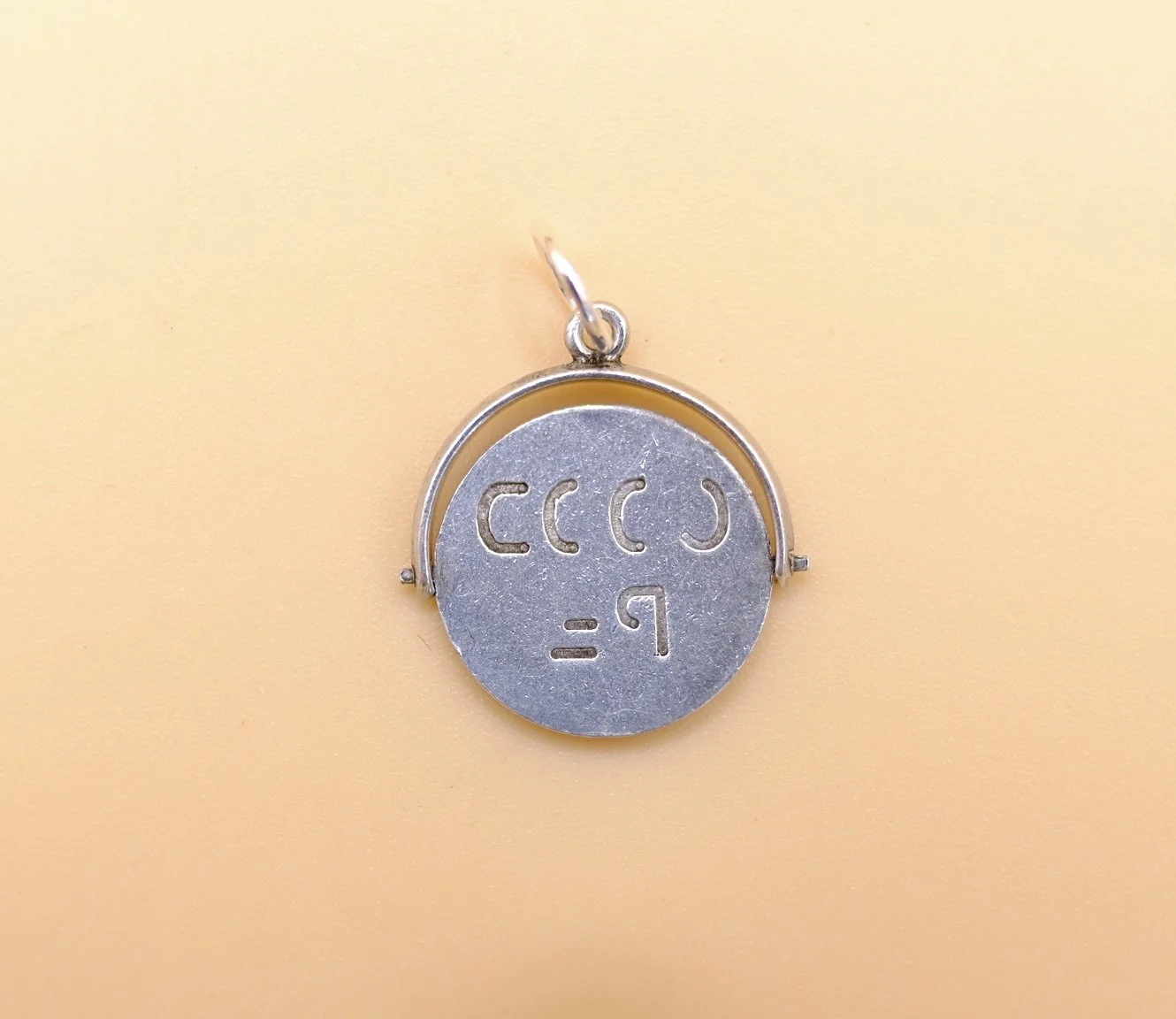 BVL1149-silver-be-good-spinning-pendant-back.jpg