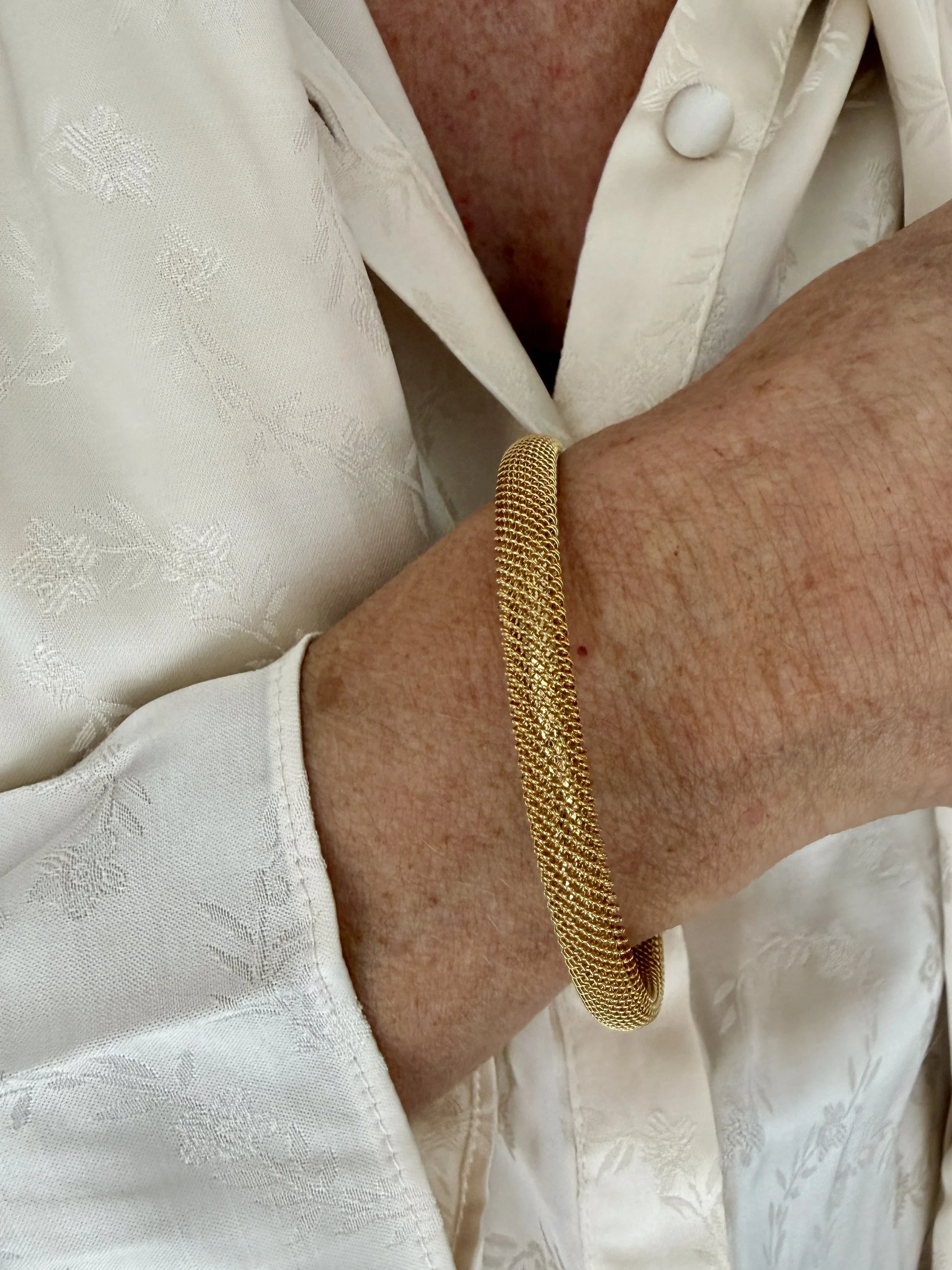 BVL1239-gold-tone-torque-bangle-worn.jpg