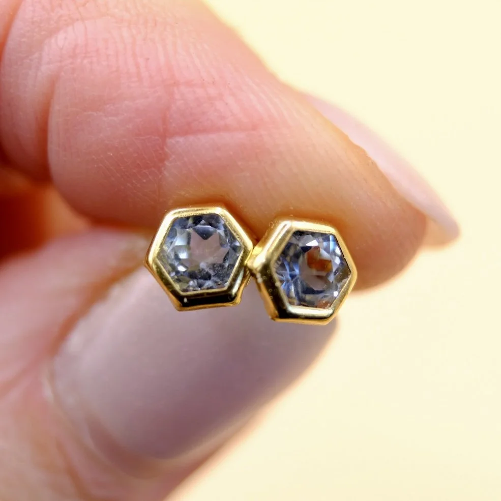 BVL1014-aqua-stud-earrings-held.jpg