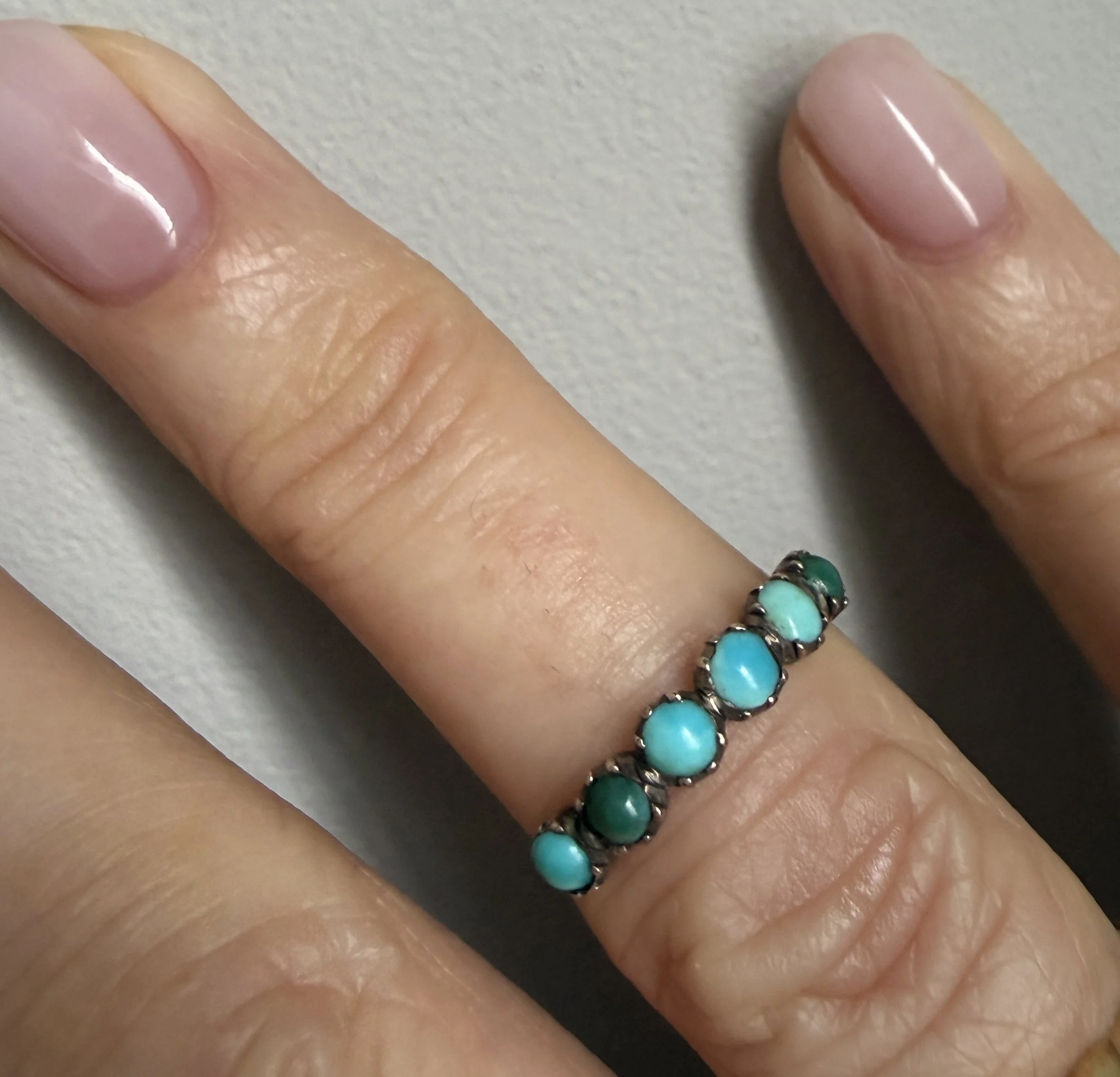 BVL858-turquoise-half-eternity-ring-worn.jpg