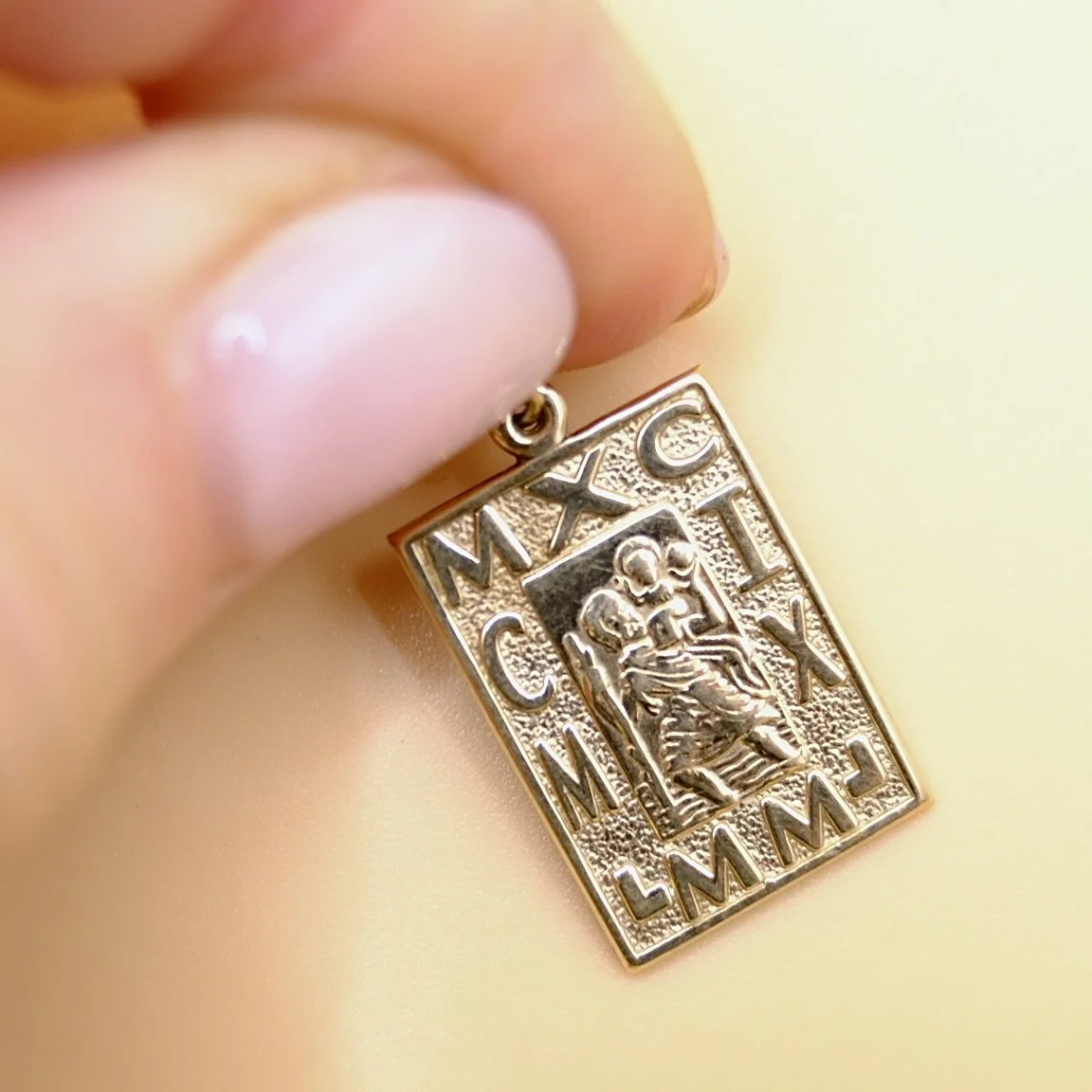 BVL1078-st-christopher-tablet-charm-held.jpg