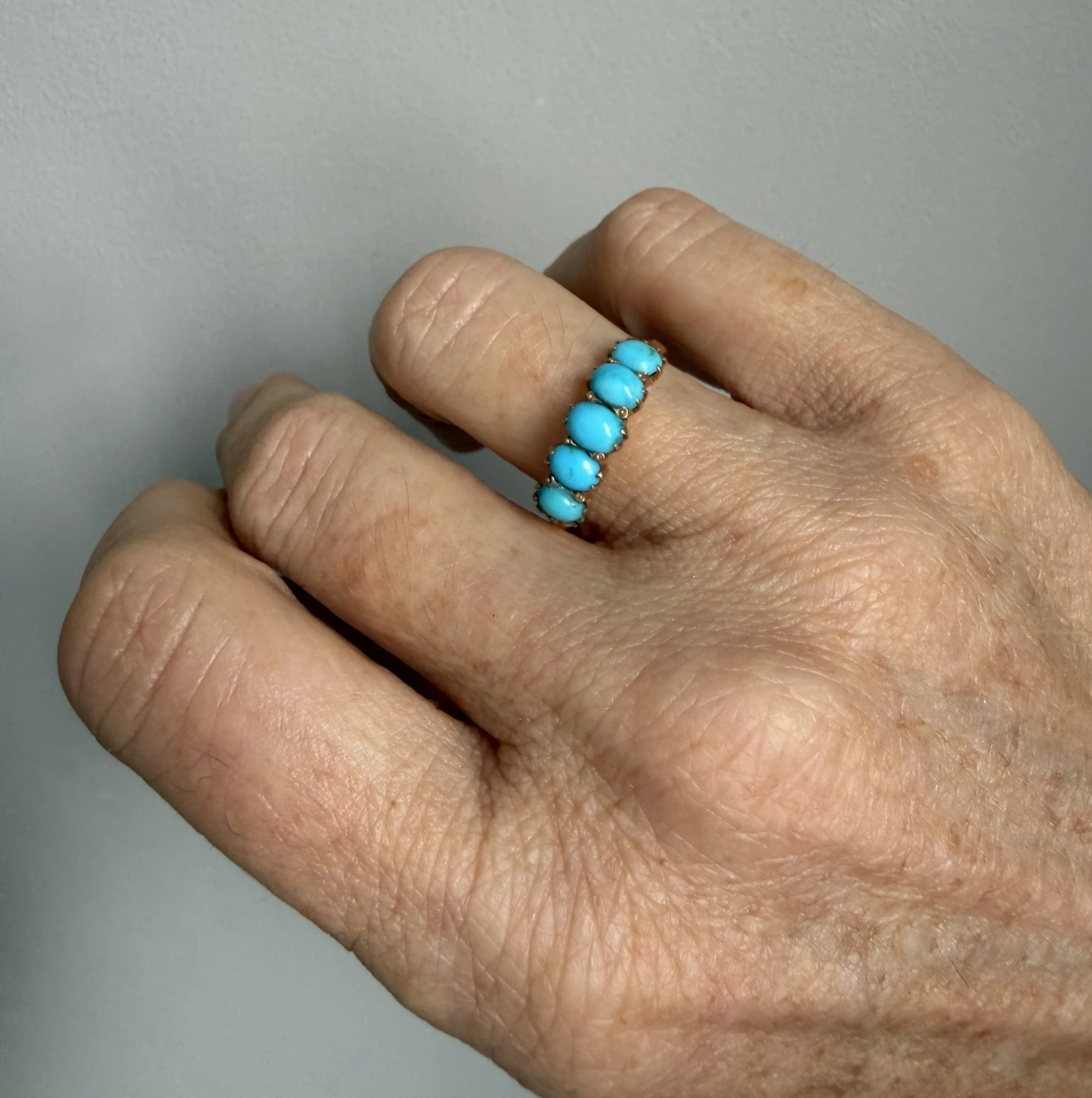 BVL1172-turquoise-half-eternity-worncool.jpg