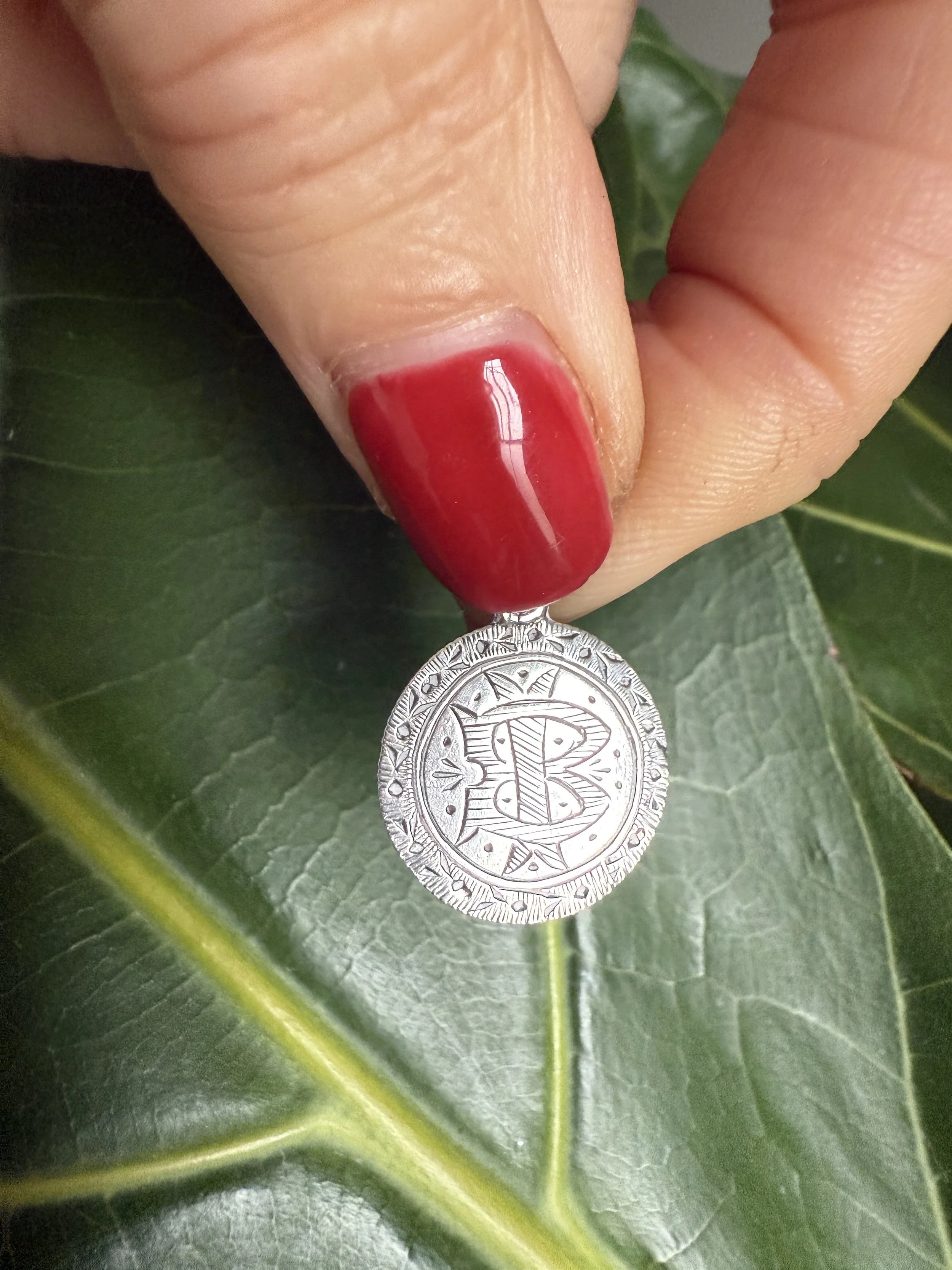 BVL105 silver IB coin held front.JPG