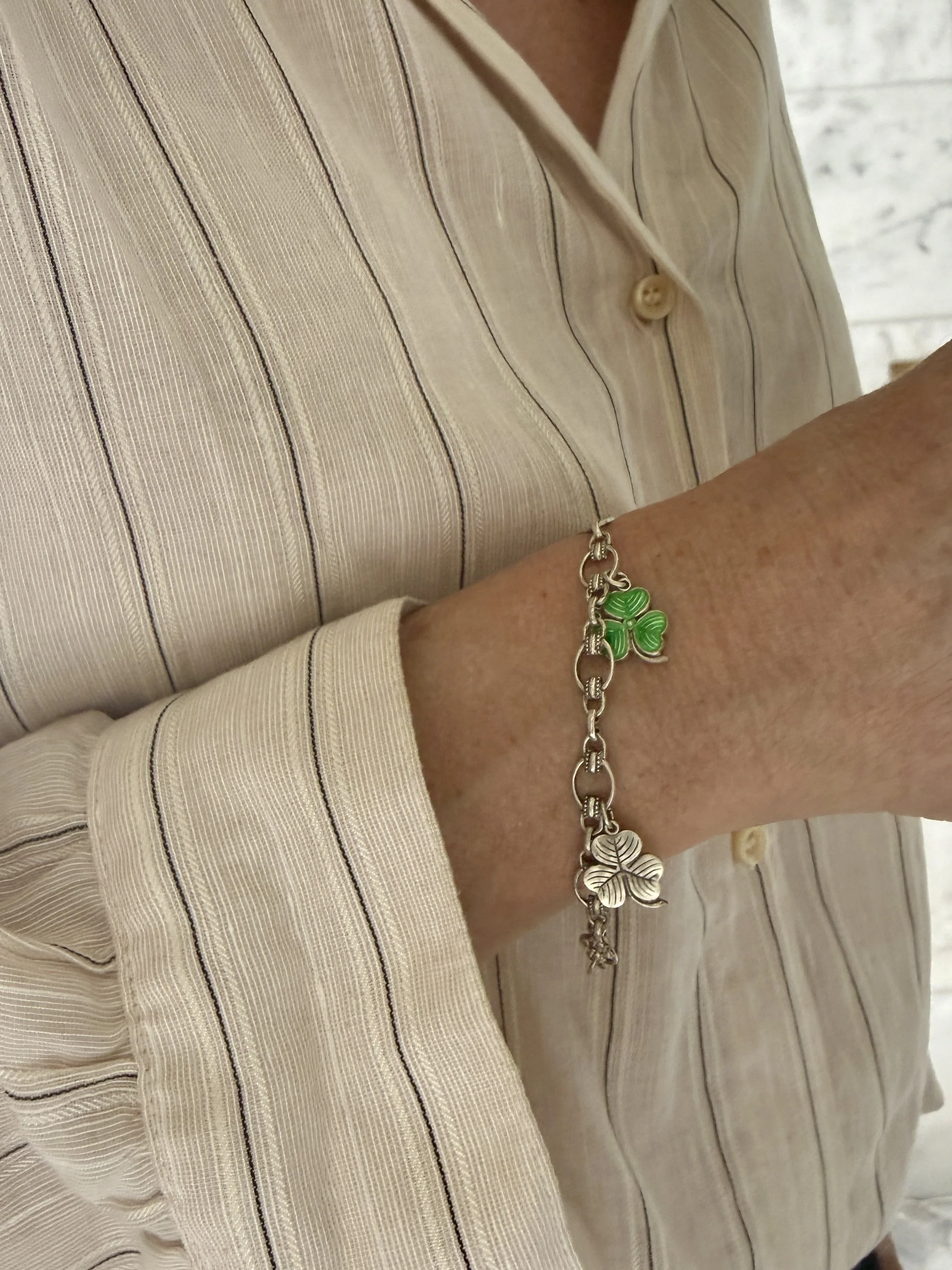 BVL1233-silver-enamel-shamrock-bracelet-worn.jpg
