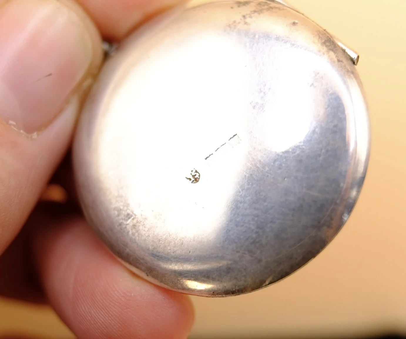 BVL1257-large-silver-embossed-locket-marks.jpg