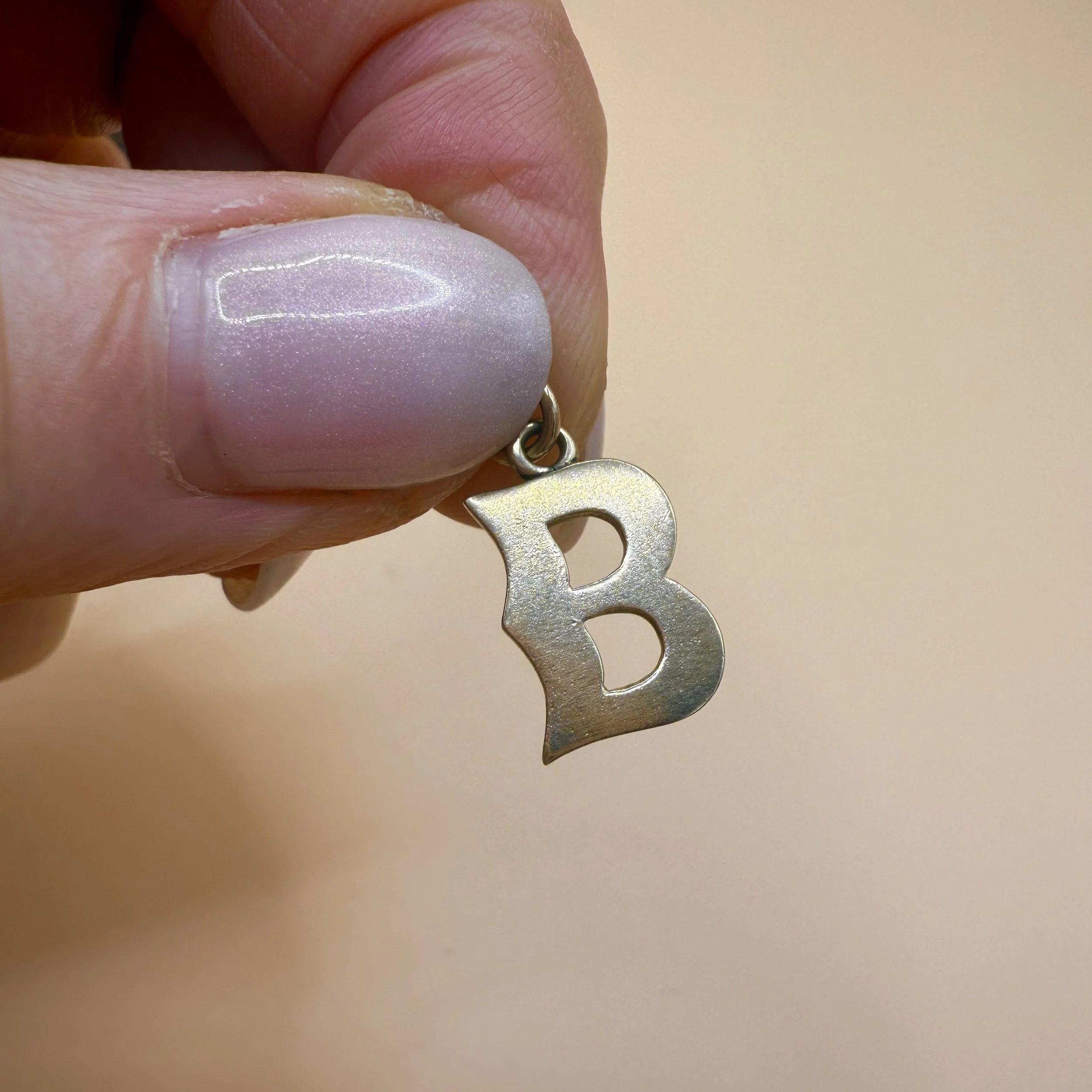 BVL1029-9ct-B-charm-held.jpg