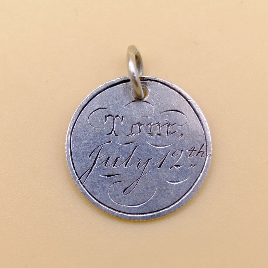 BVL1026-silver-Tom-coin.jpg