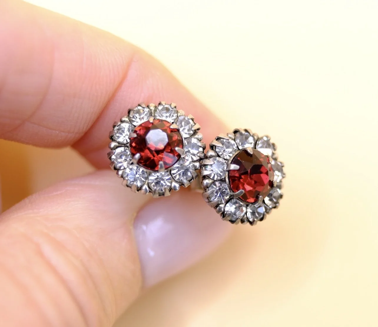 BVL868-red-daisy-paste-stud-earrings-held.jpg