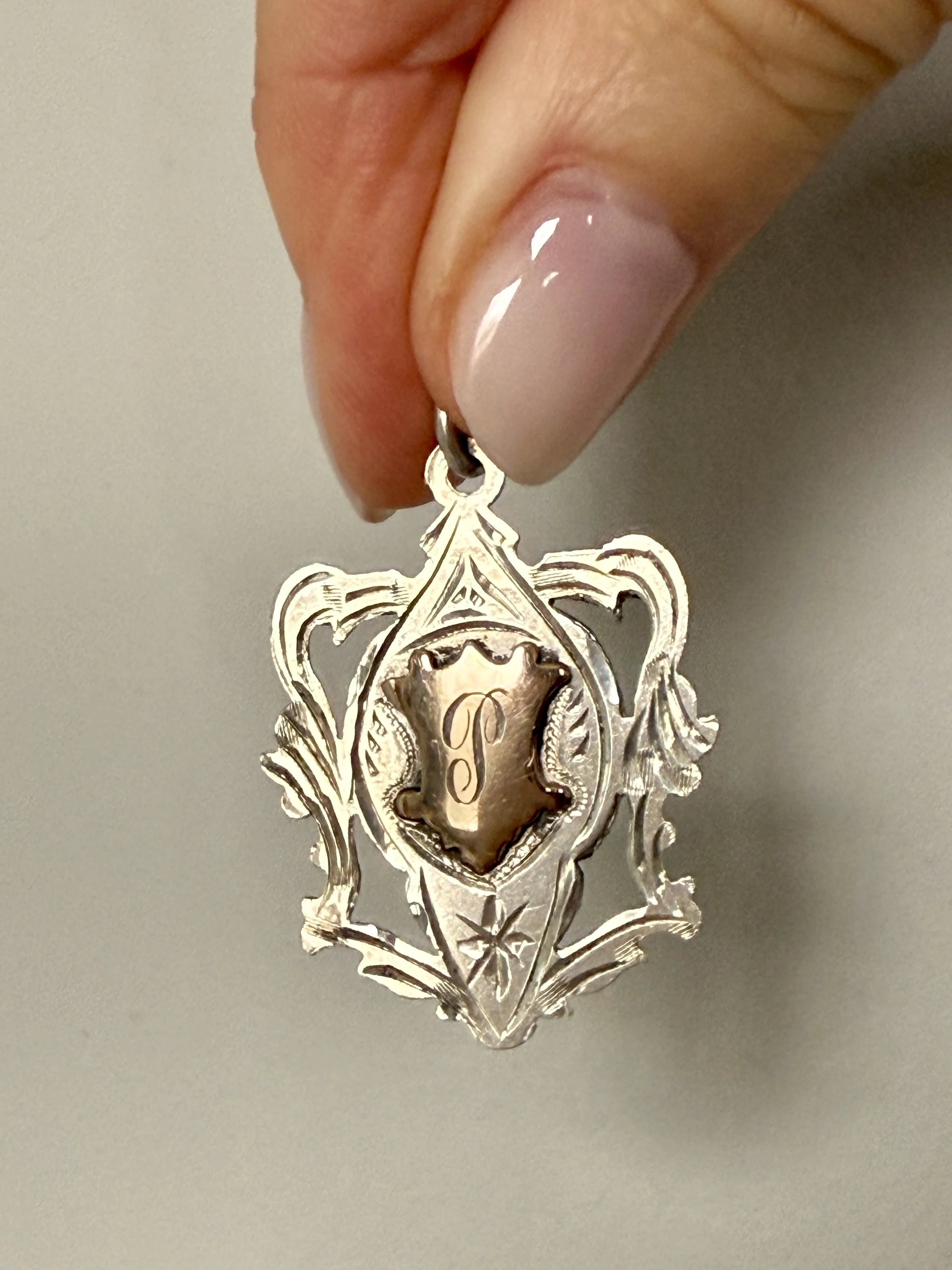 BVL991-silver-P-watch-fob-held.jpg