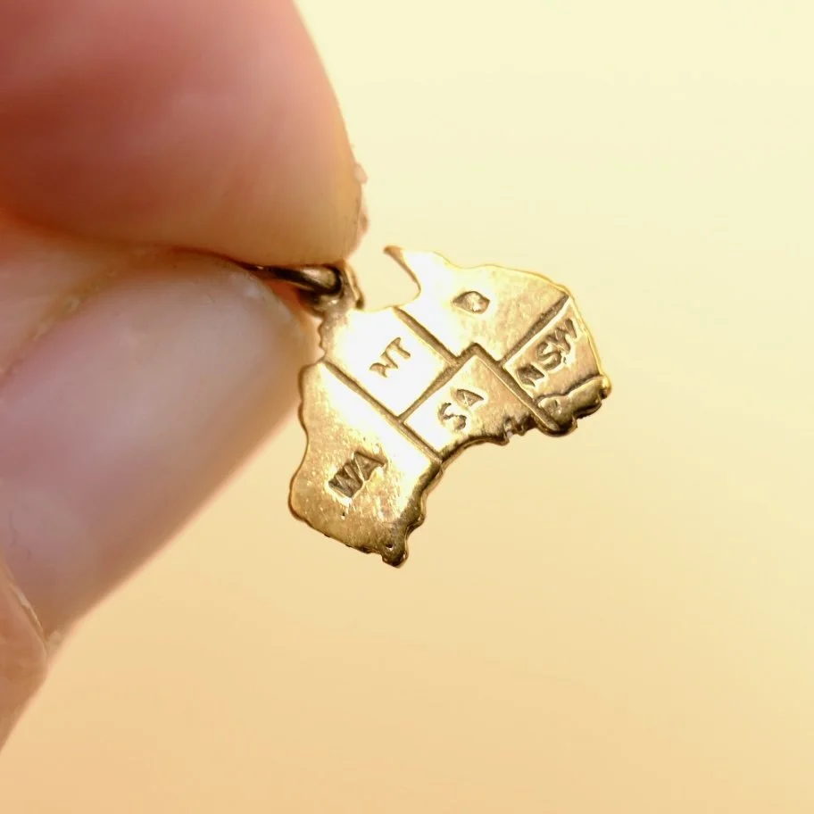 BVL1228-australia-map-charm-held.jpg