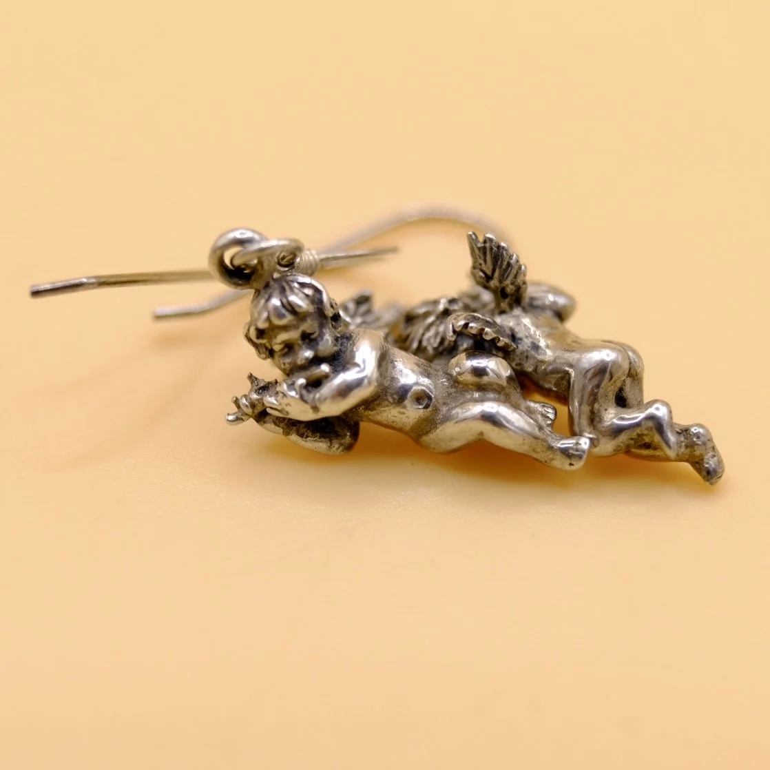 BVL1012-silver-cupid-earrings-side.jpg