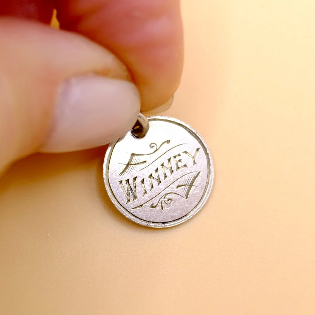 BVL817 winney coin held.jpg