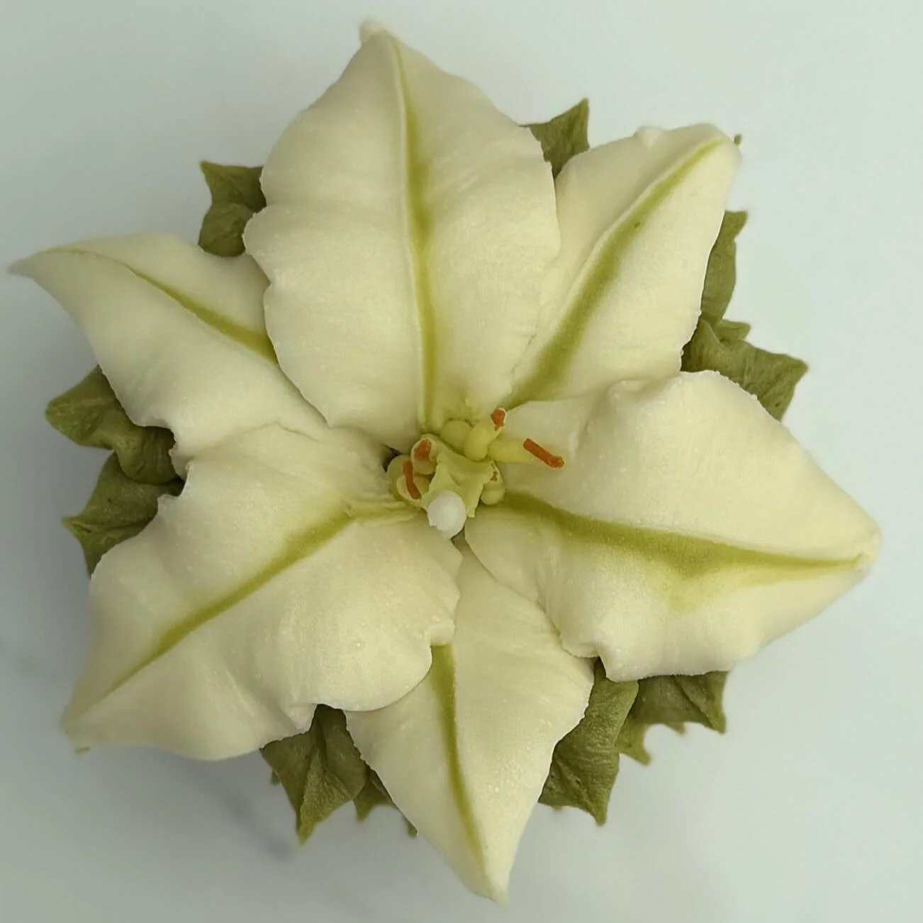 White Stargazer Lily cupcake