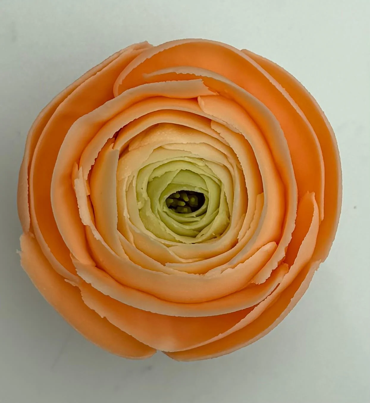 Peach Ranunculus cupcake