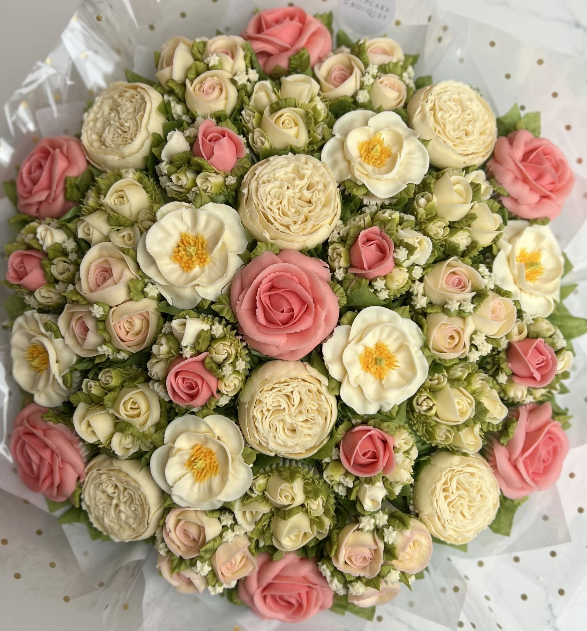 Just Roses
37 cupcake bouquet of 6 different blooms (55 x 55cm)