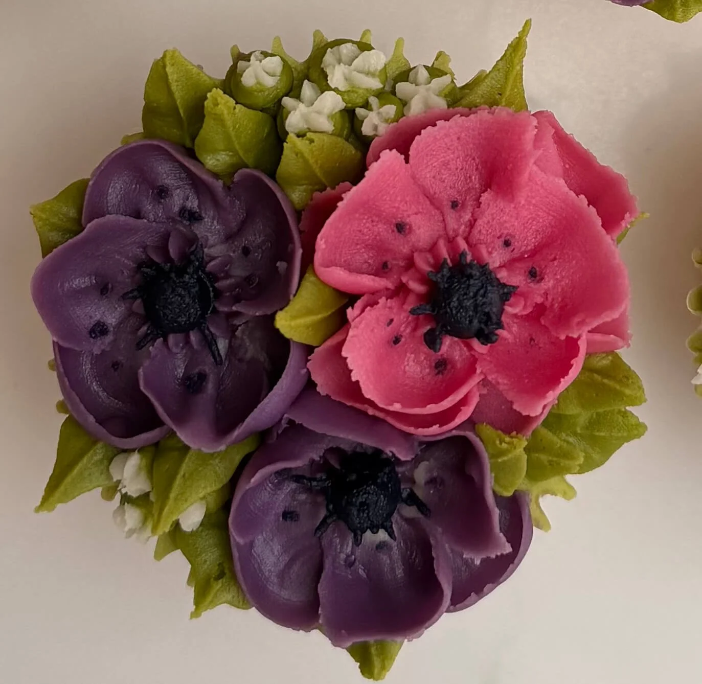 Trio of anemones with gypsophila