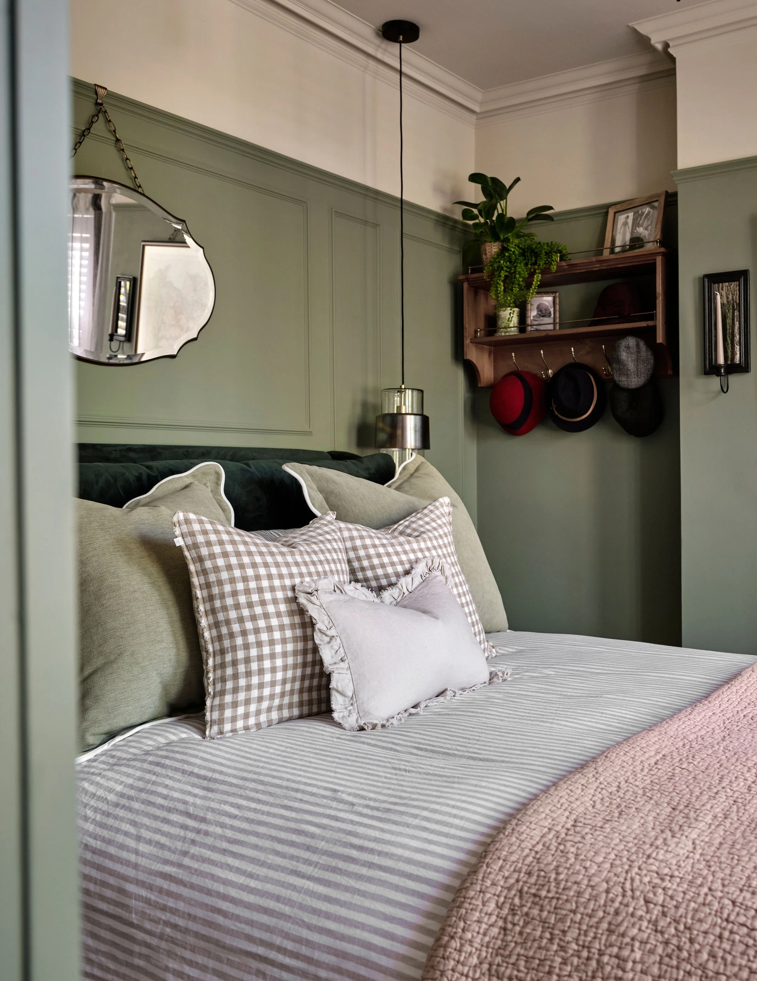 Vicotrian details and wainscoting nods to the age of the property  while oversized lights creates a contemporary edge to this beautiful space