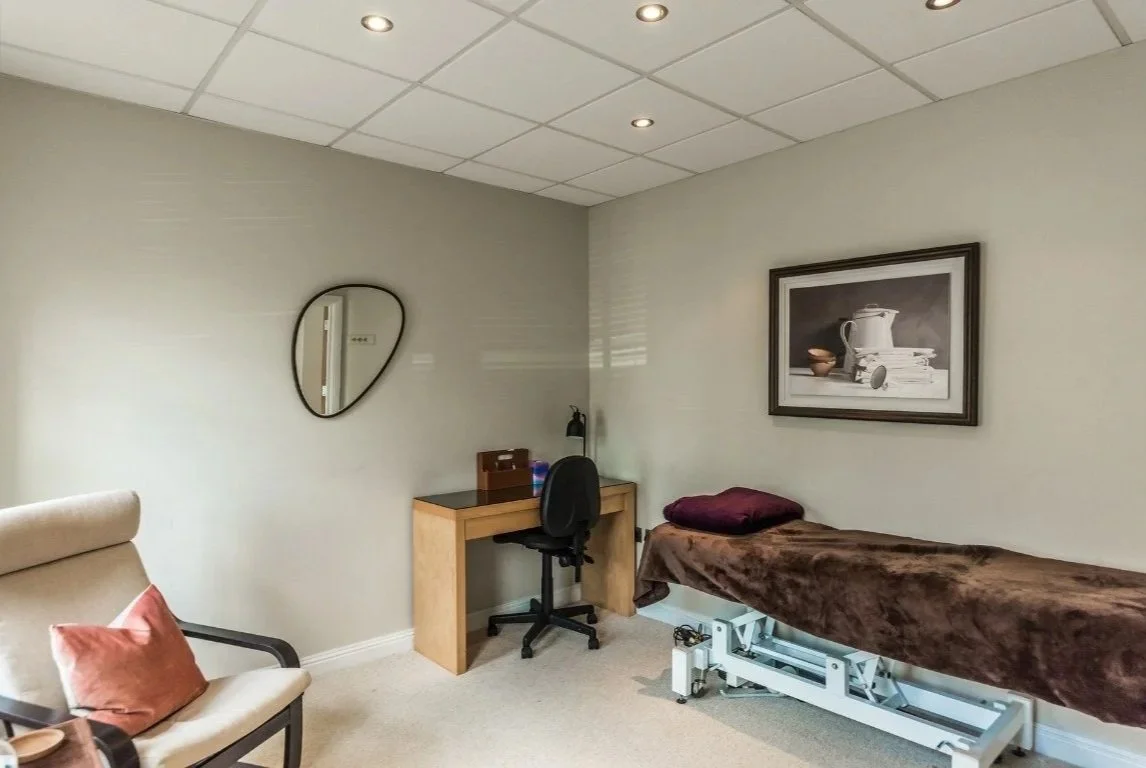 therapeutic couch in relaxing therapy room poundbury