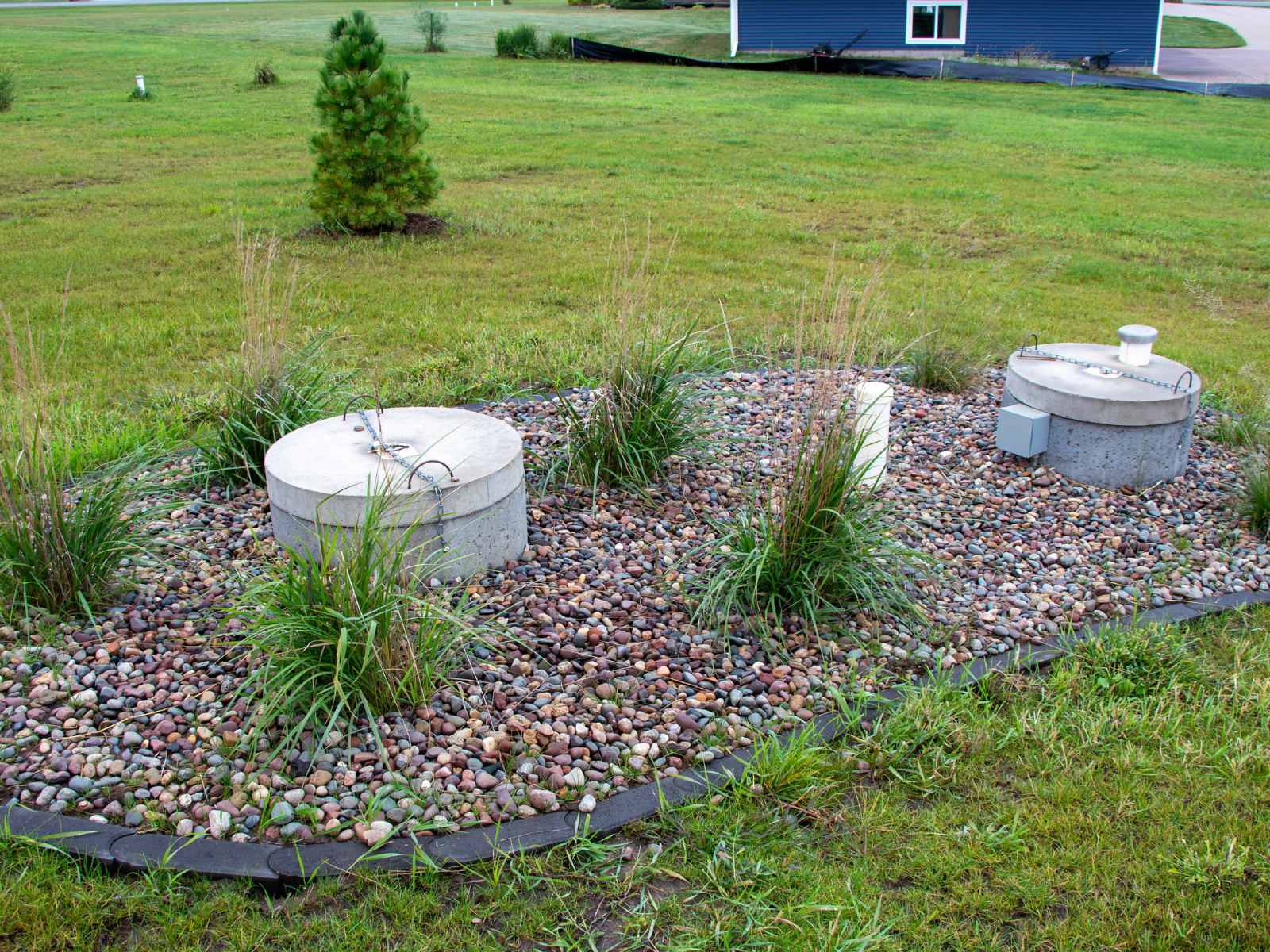  Irrigation system components integrated into landscaped planting bed 
