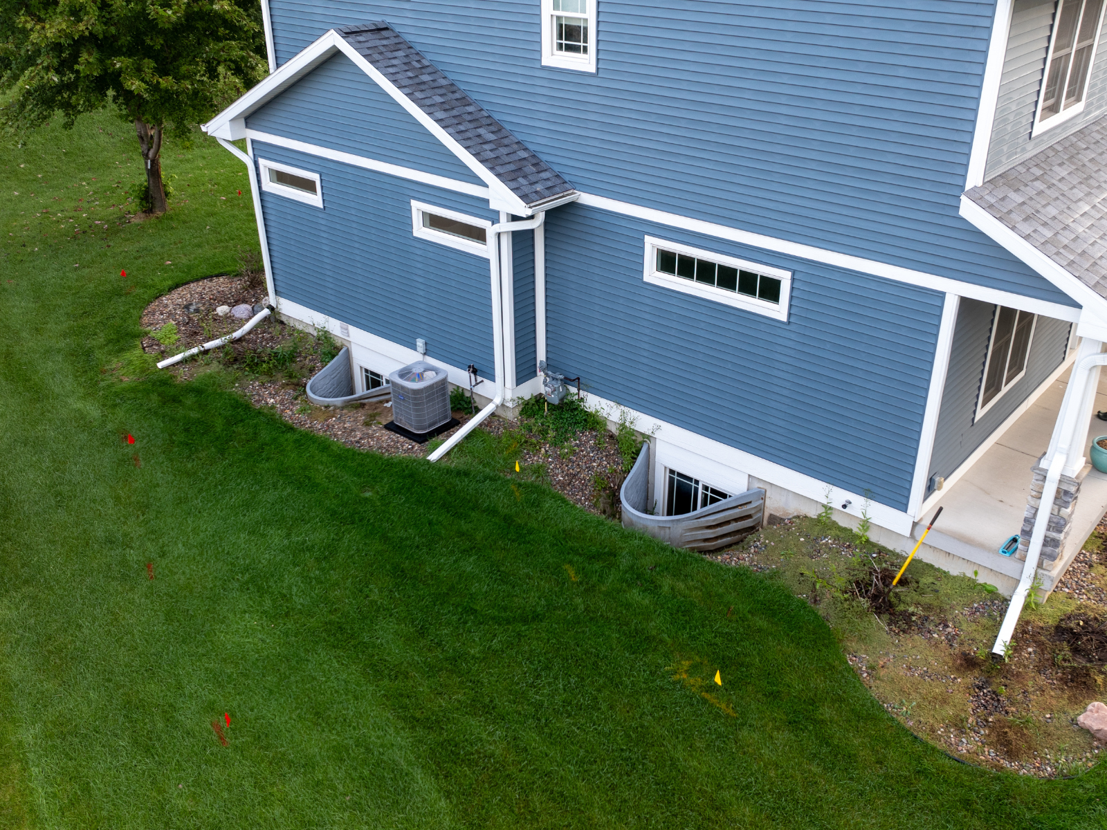 Aerial view of backyard patio and lawn