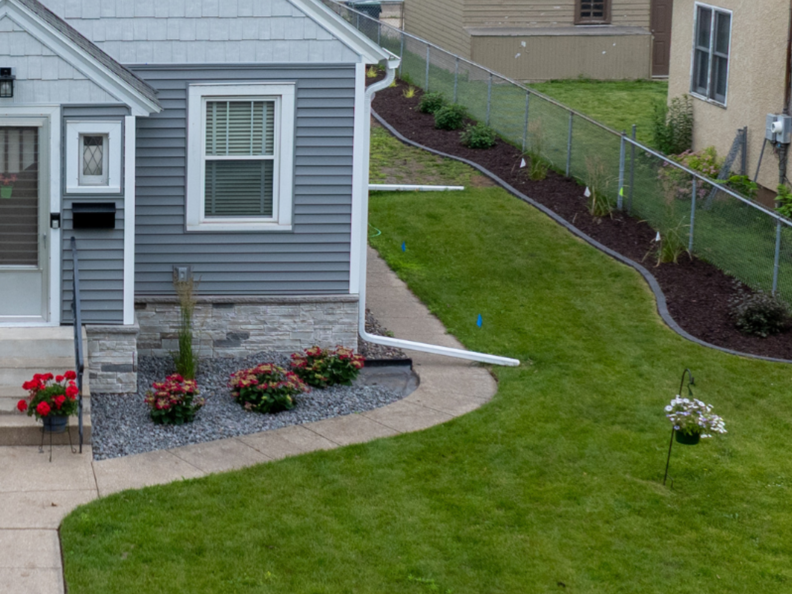 side of front of house plant beds