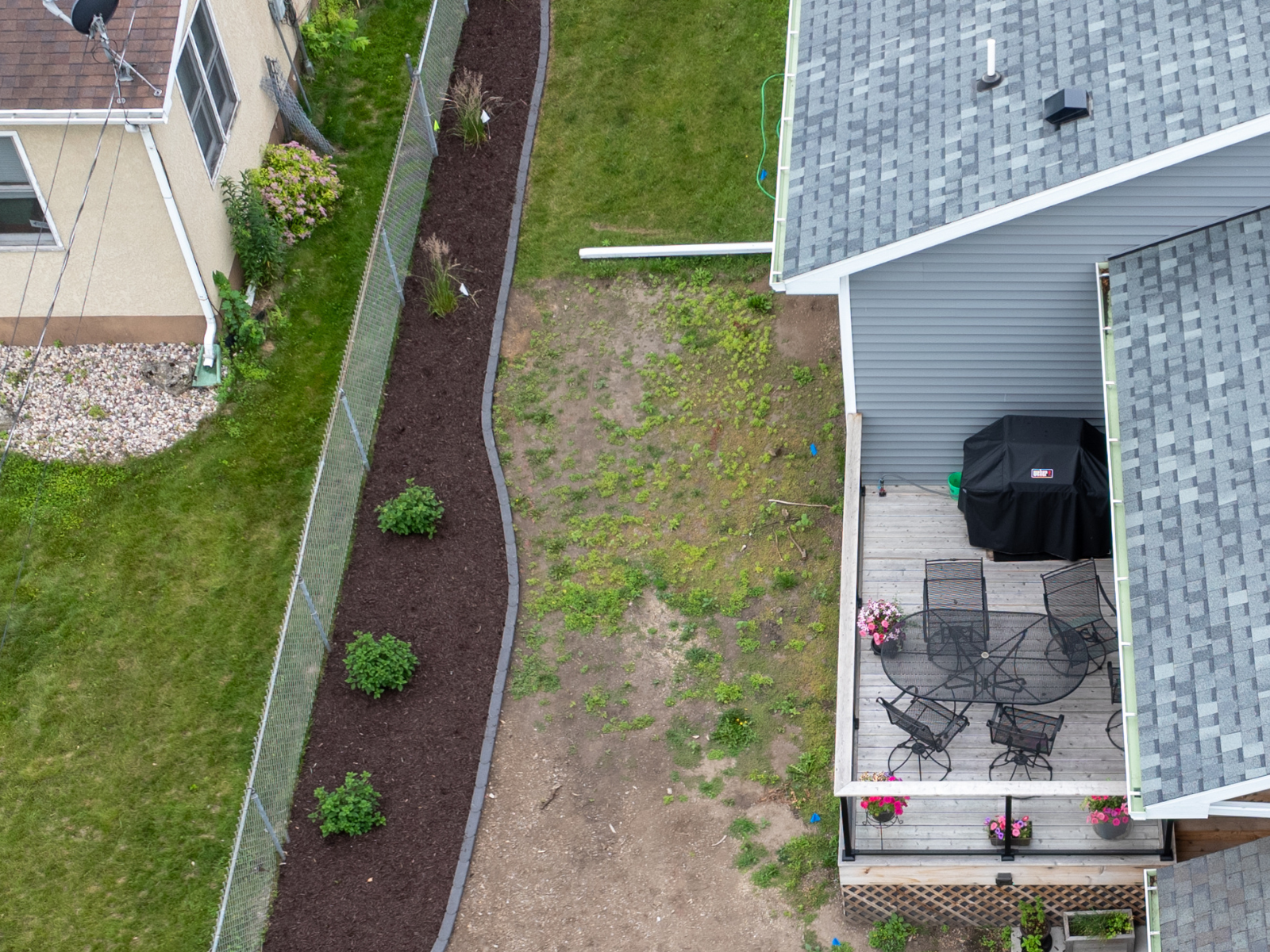 side of house plant beds