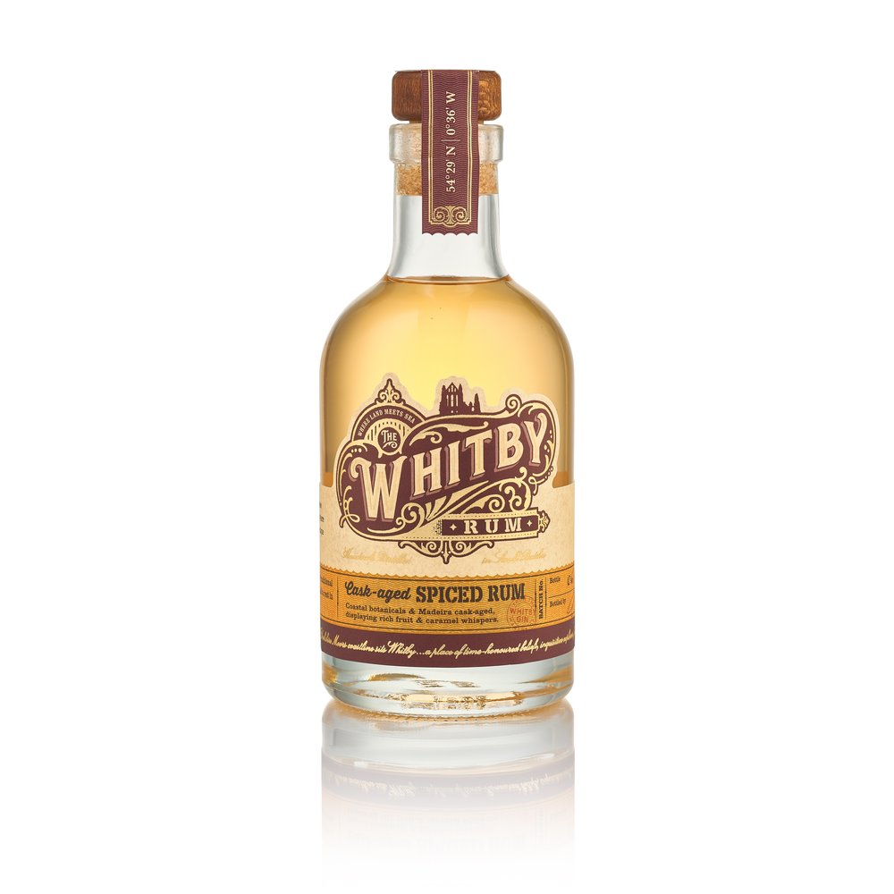  White background cutout/packshot of Whitby Distillery Gin with reflection to base 5 
