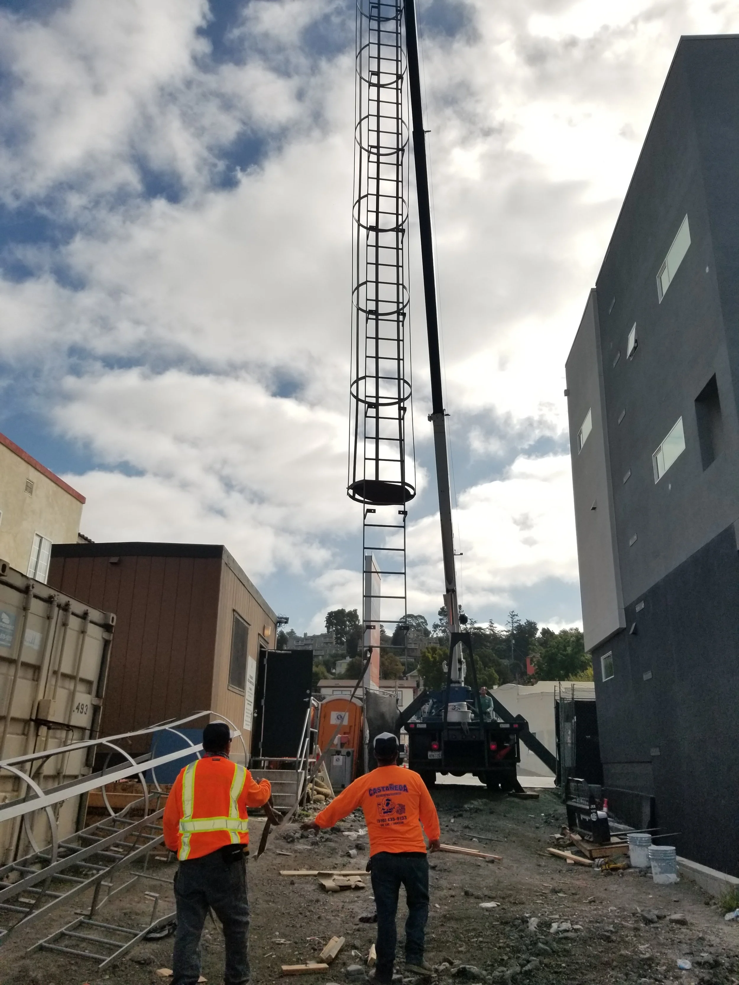 The team of full service custom ironwork contractors are doing the installation with ironwork team members.