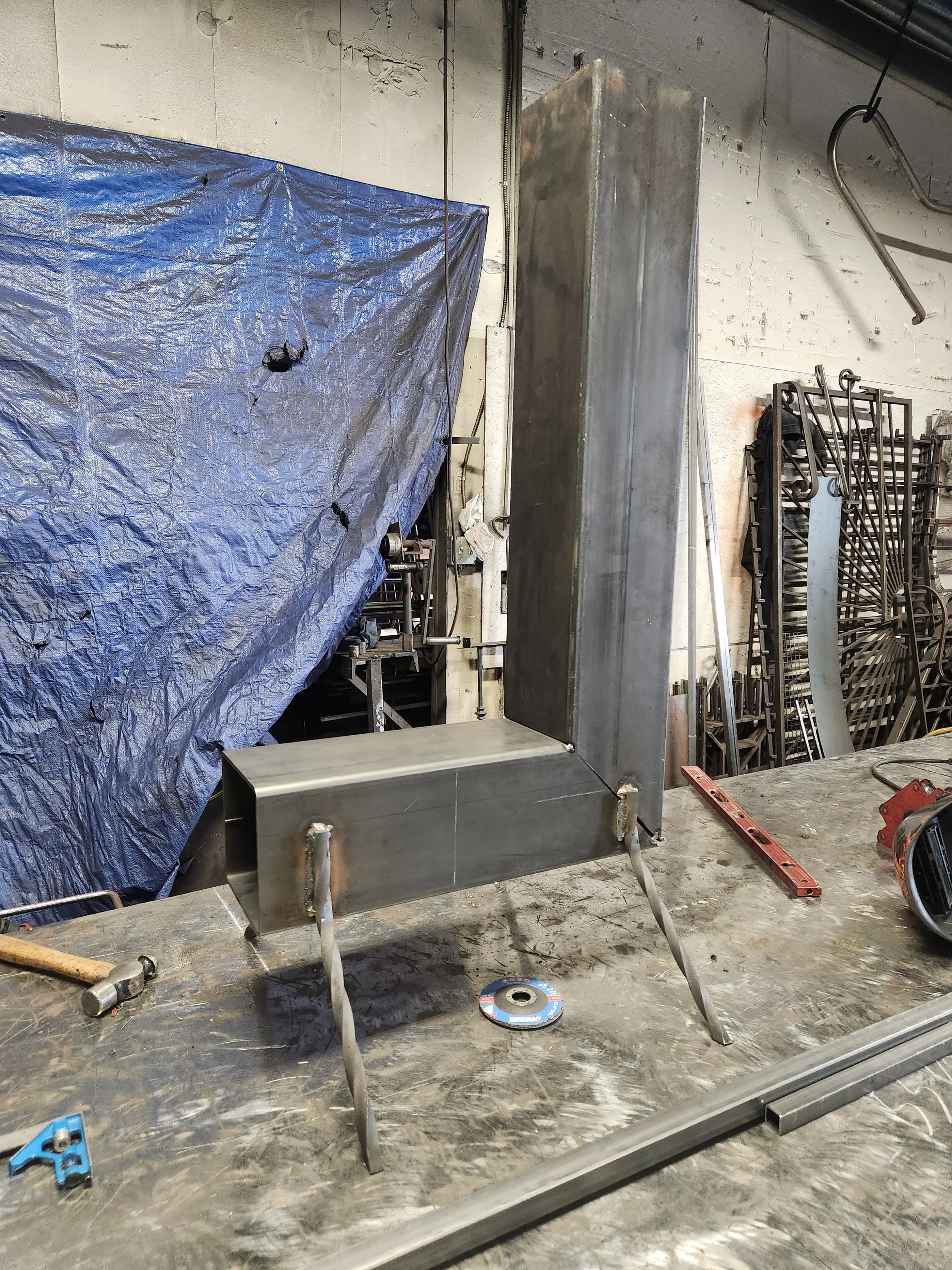 The best iron warehouse in the area, featuring a large square metal tube. Witness the industrial prowess of our space, showcasing the durability and scale of our materials.
