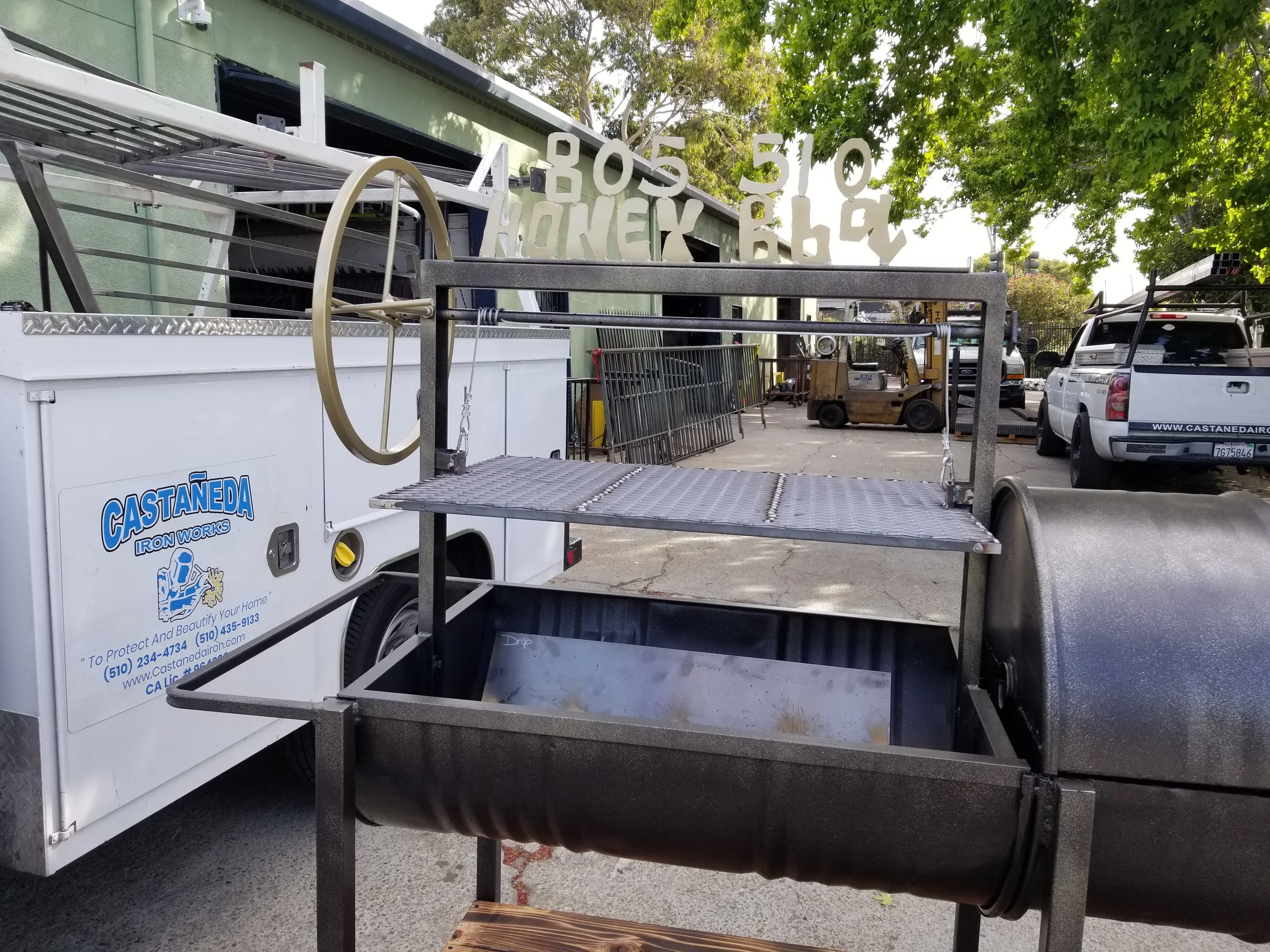 The black grills where you cook in the bbq pit made by the professional in welding with iron materials. 