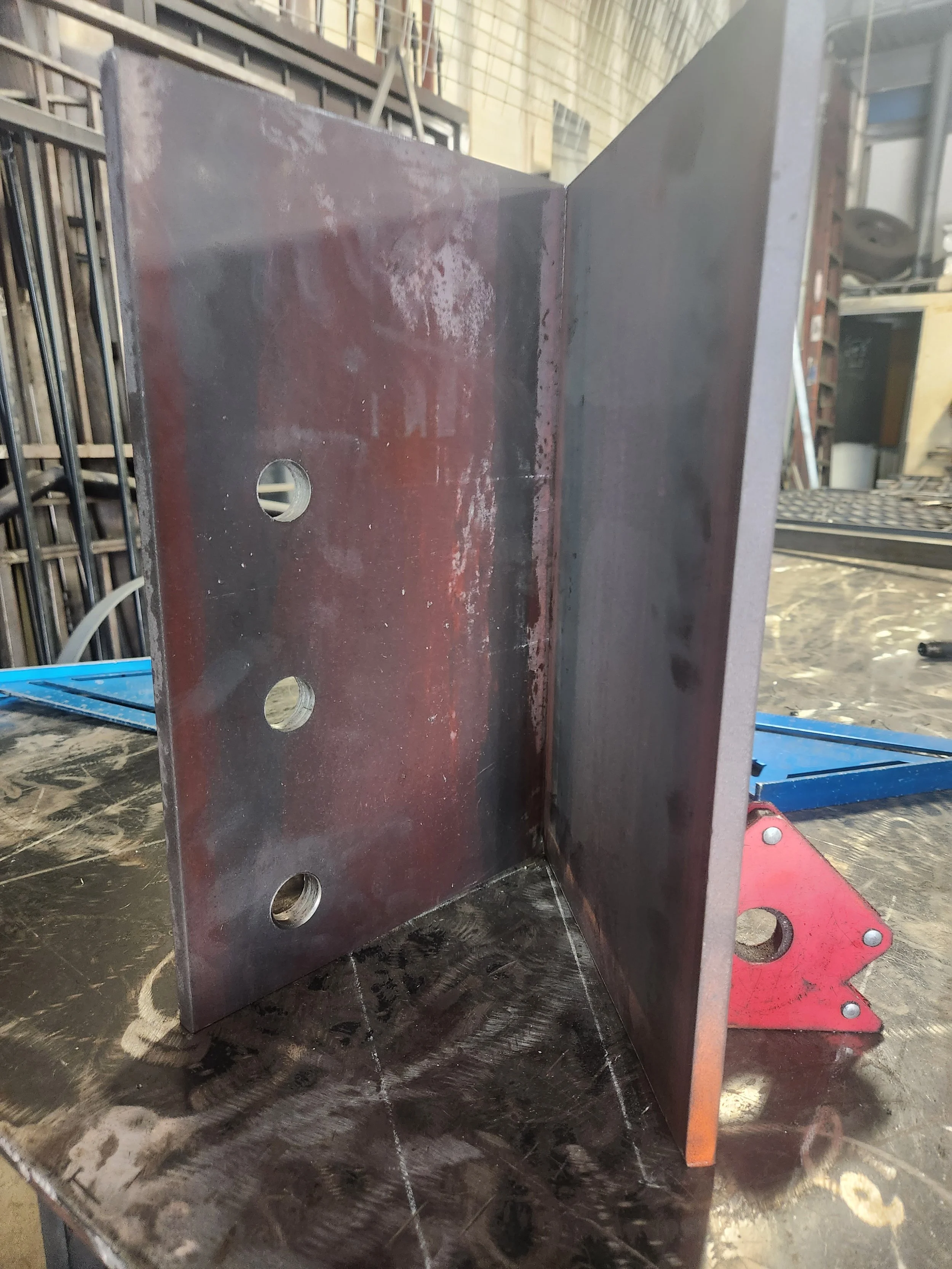 The expertise of an experienced ironworks professional at work. Donned in protective uniform, this skilled artisan is shaping excellence in a welding project. 