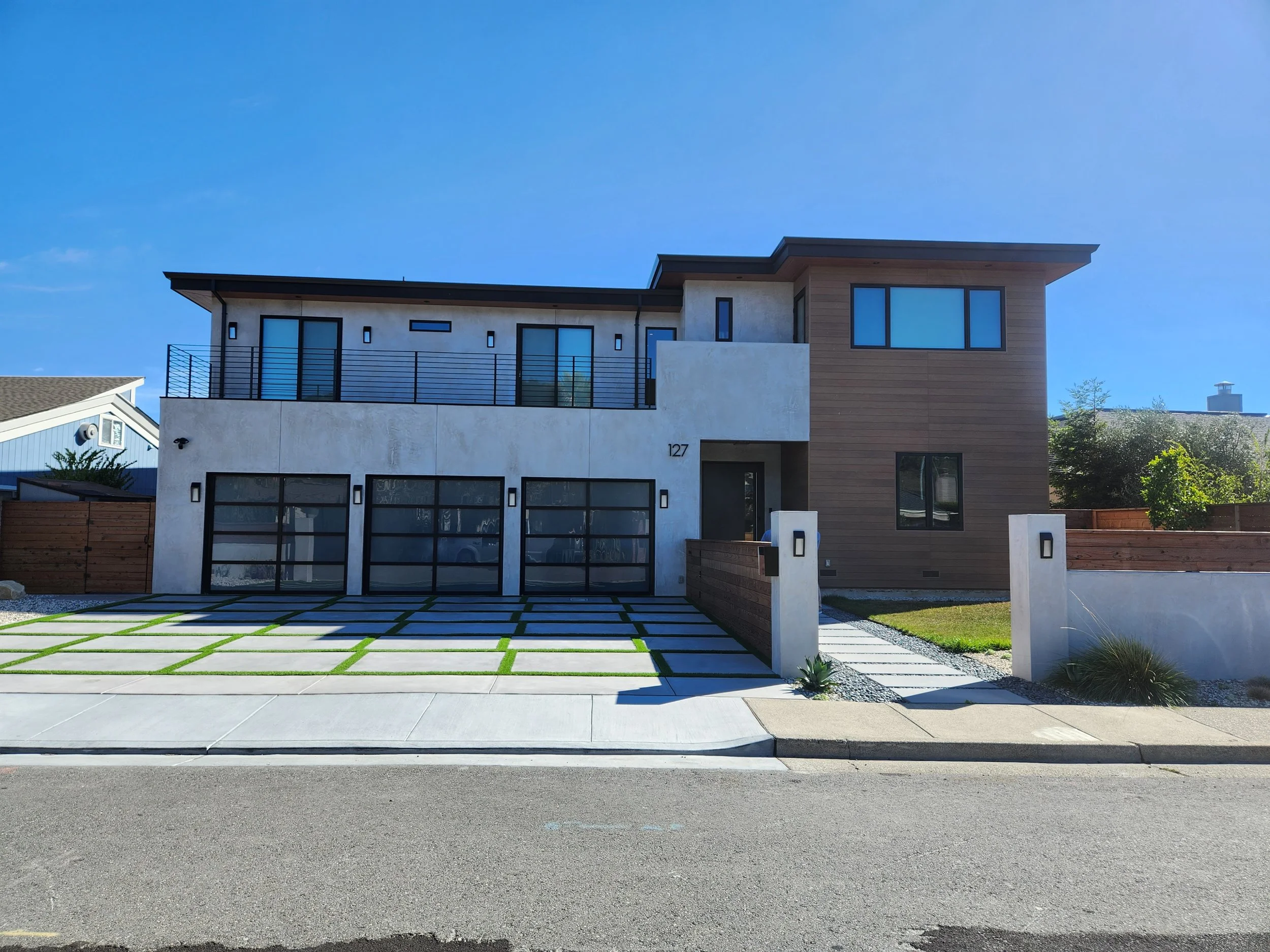 The elegant house in Northern California regions with some black guardrails.