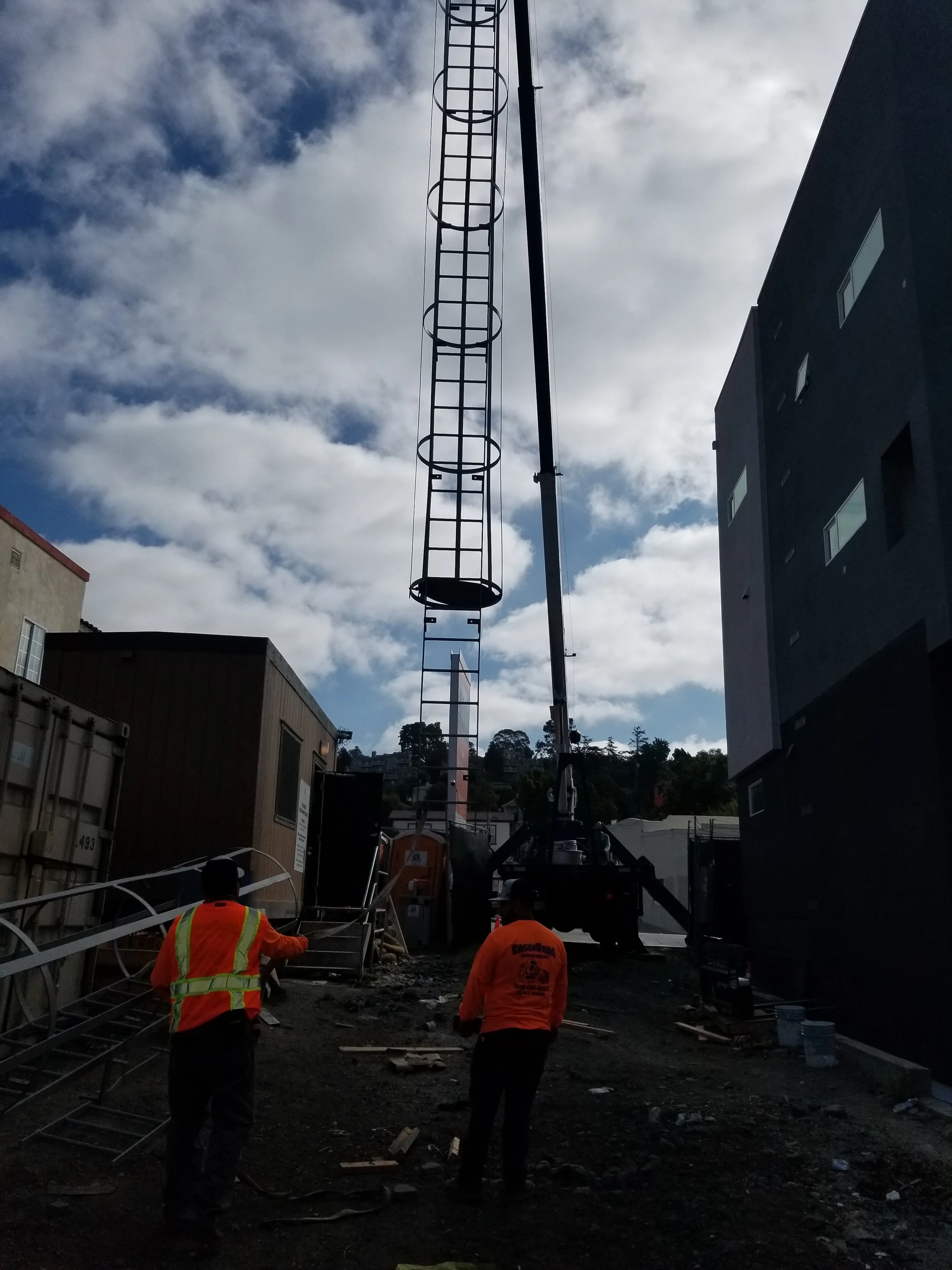 The team of full service custom ironwork contractors are doing the installation with ironwork team members.