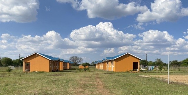 Clinic Staff Housing Compound from the entrance, volleyball court on right.jpg