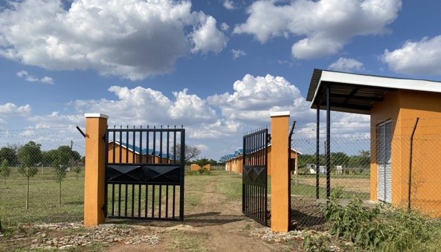 Clinic Staff Housing Entrance Gate and guard house from outside.jpg