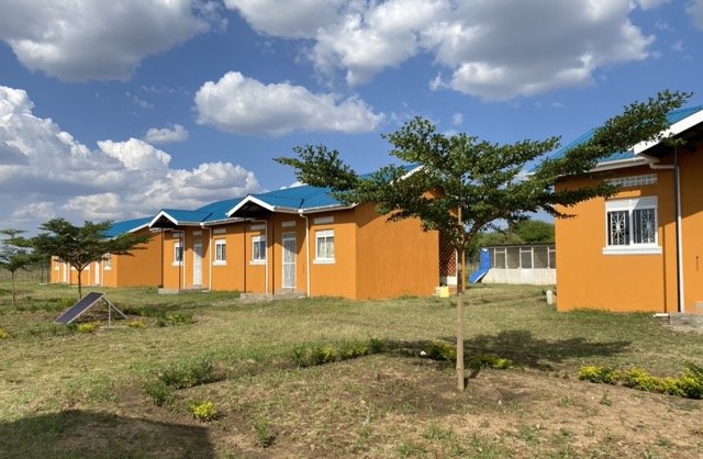 Clinic Staff Housing One row of three duplexes from inside.jpg