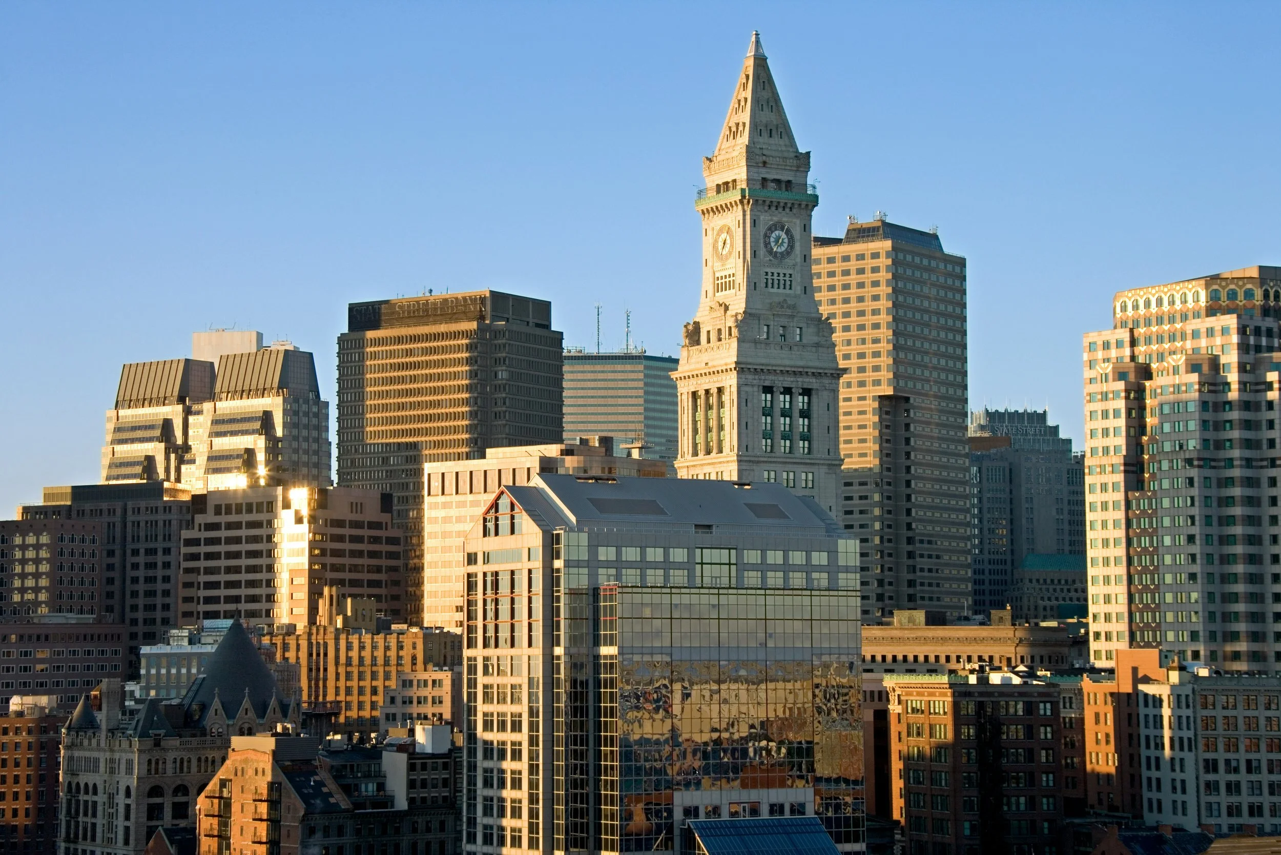 Boston skyline representing Long Angle’s high-net-worth peer community, where members connect through local events and online discussions.