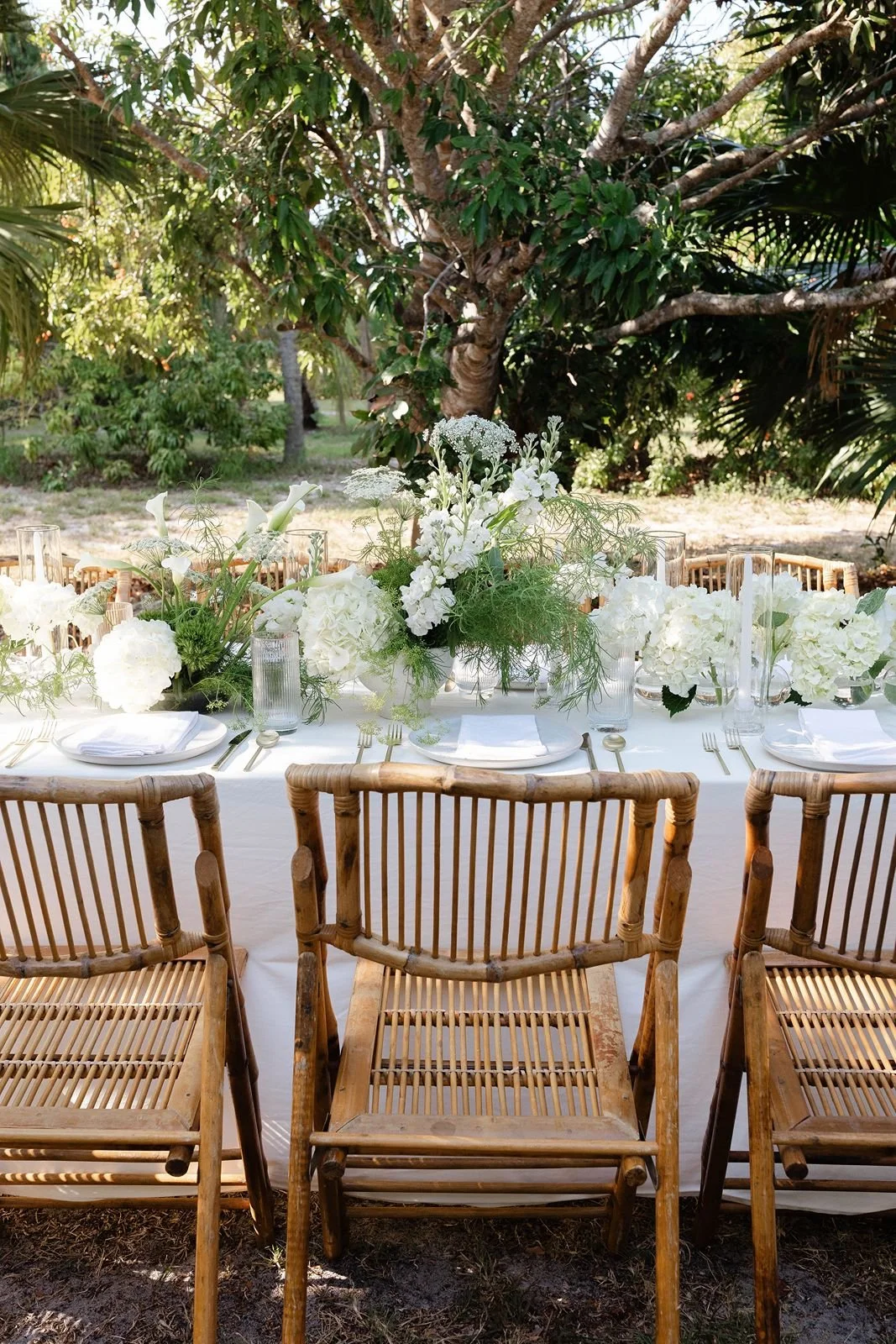 Garden Wedding Venue with florals set on a table in the garden