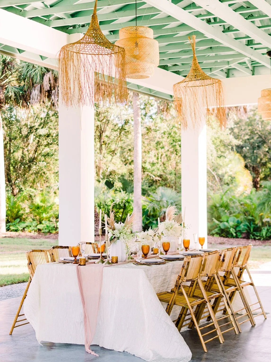 Outside Wedding Venue with a reception table set.