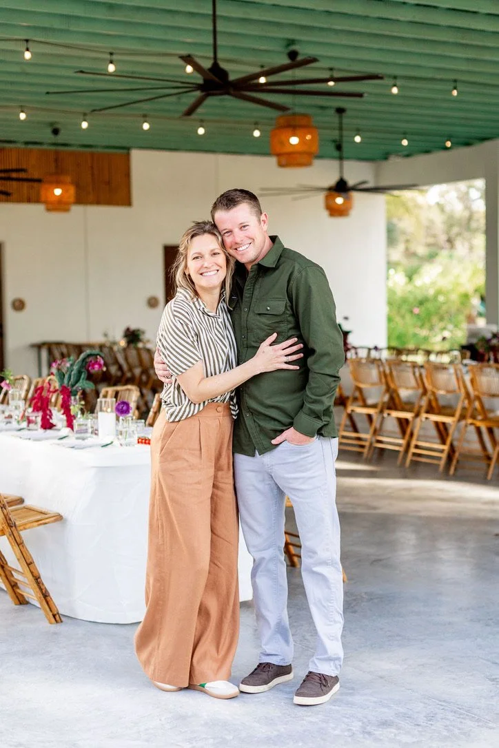 Wedding Venue Owners stand in their Outside Wedding Venue.