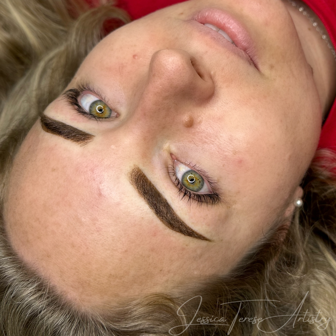 Permanent makeup on eyebrow using ombre powder brow tattooing method