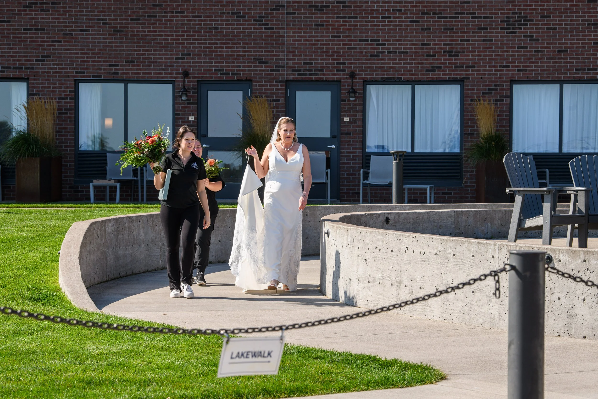 Bride and groom enjoying their wedding day, unstressed because they hired wedding planners.