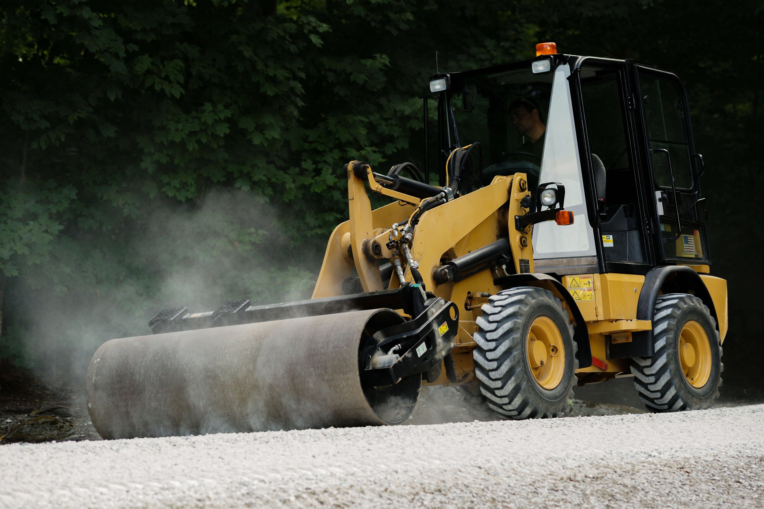 steam roller doing driveway repair