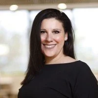 woman with brown hair smiling