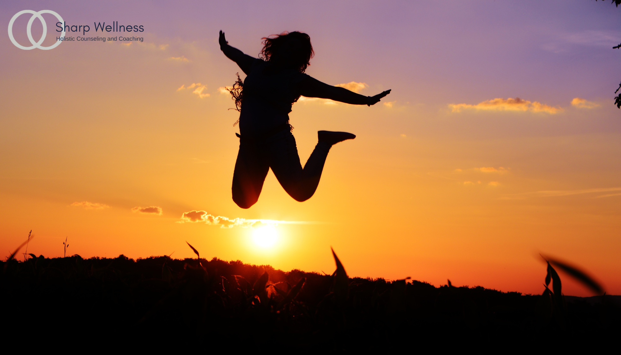 Person jumping at sunset, symbolizing personal growth, reinvention, and creating a more fulfilling life through life coaching.