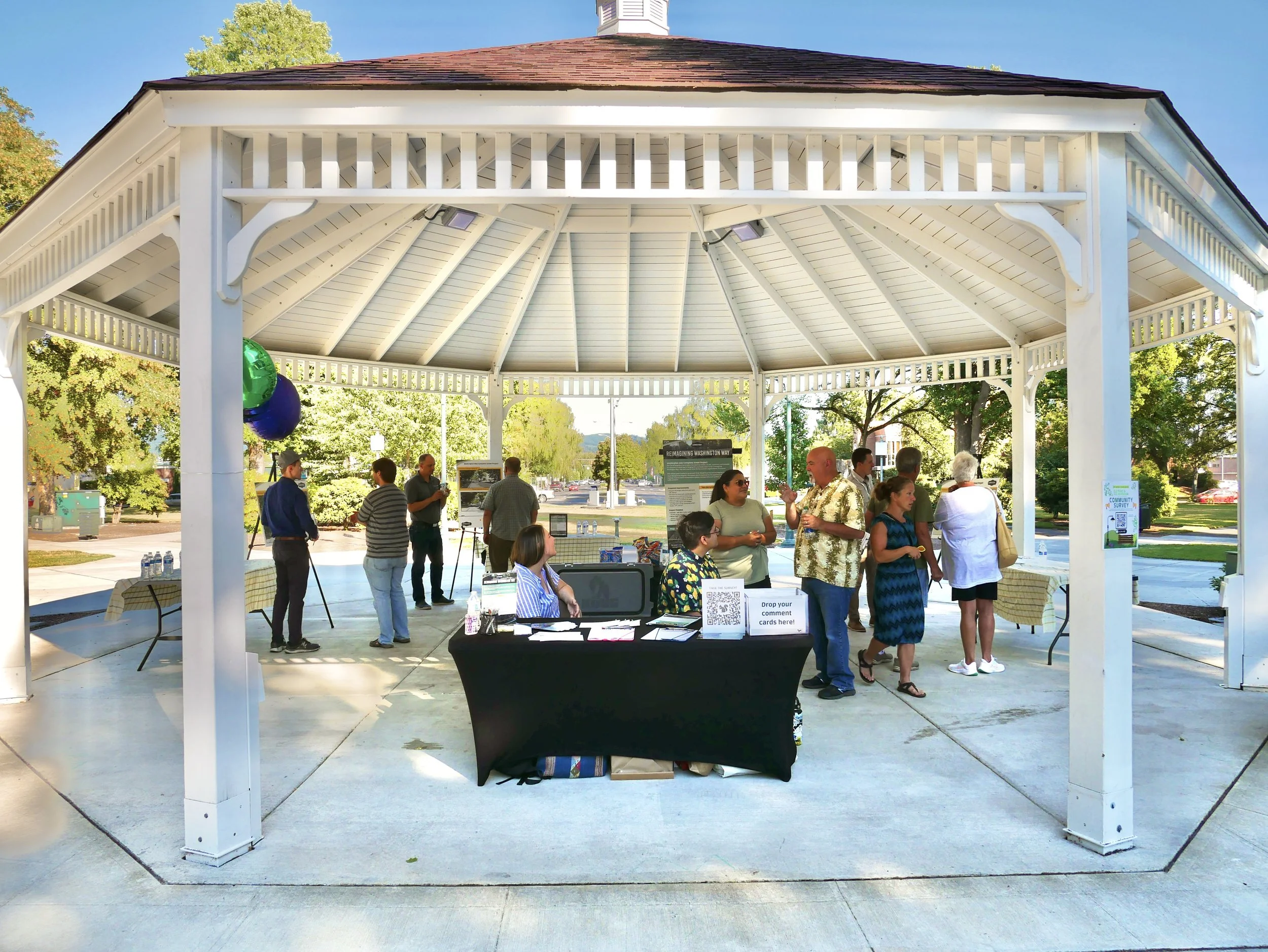 Image shows a group of people at an open house